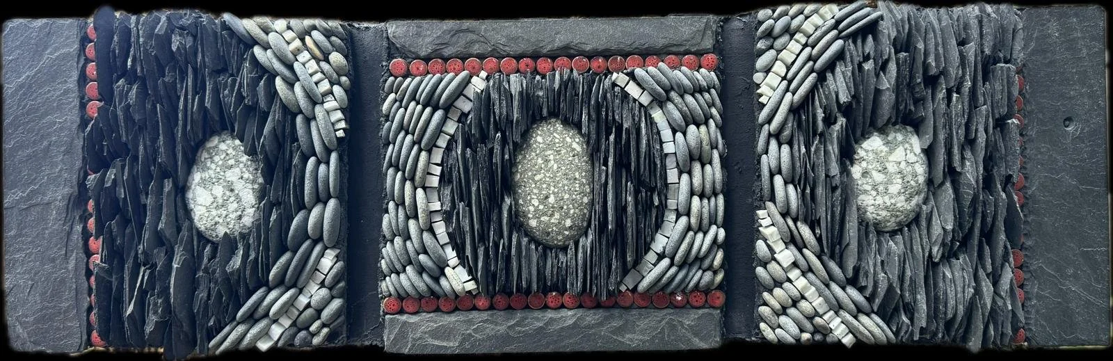 "Igneous Triptych" - Three beach pebbles of igneous "porphyritic andesite" scavenged from North Beach, Port Townsend, WA, brought to the shores of the Salish Sea from points north during the last ice age. Slate, beach pebbles, Smalti, ceramic beads. 