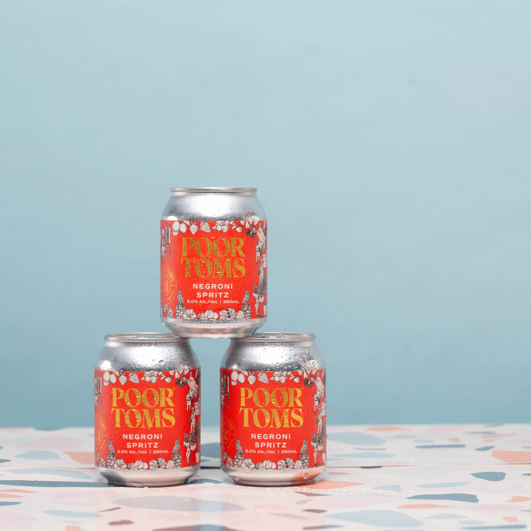 PoorToms-CraftCocktails-NegroniSpritz-hand.gif