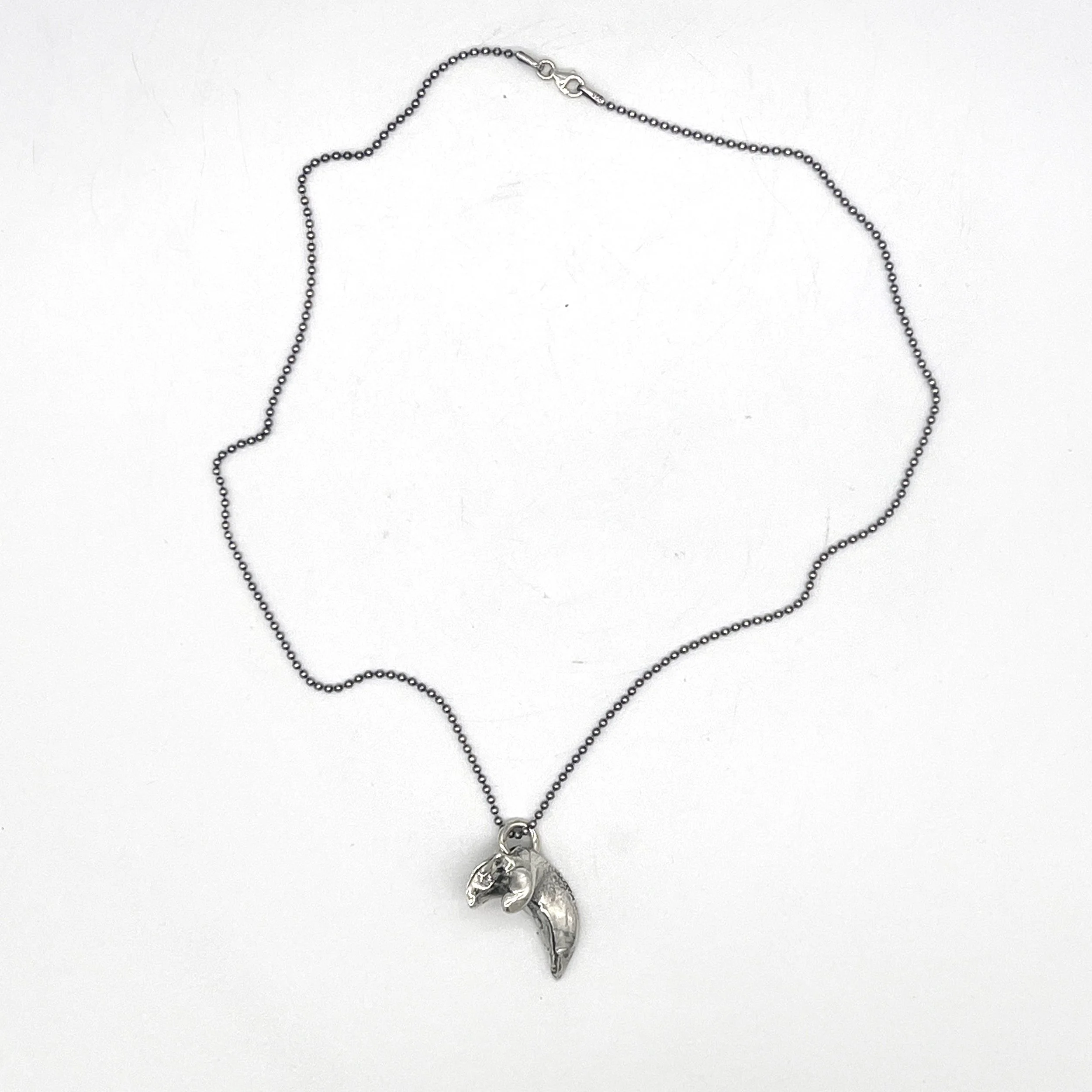 T.TANG Calcified Claw Pendant