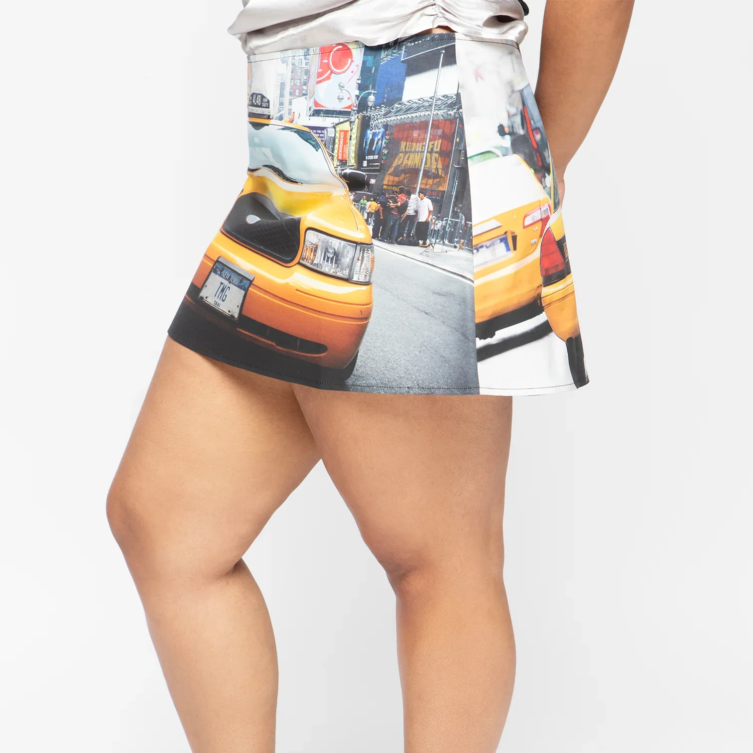 CAMILLA_MINISKIRT_TAXI_SIDE_1512x.jpg.png