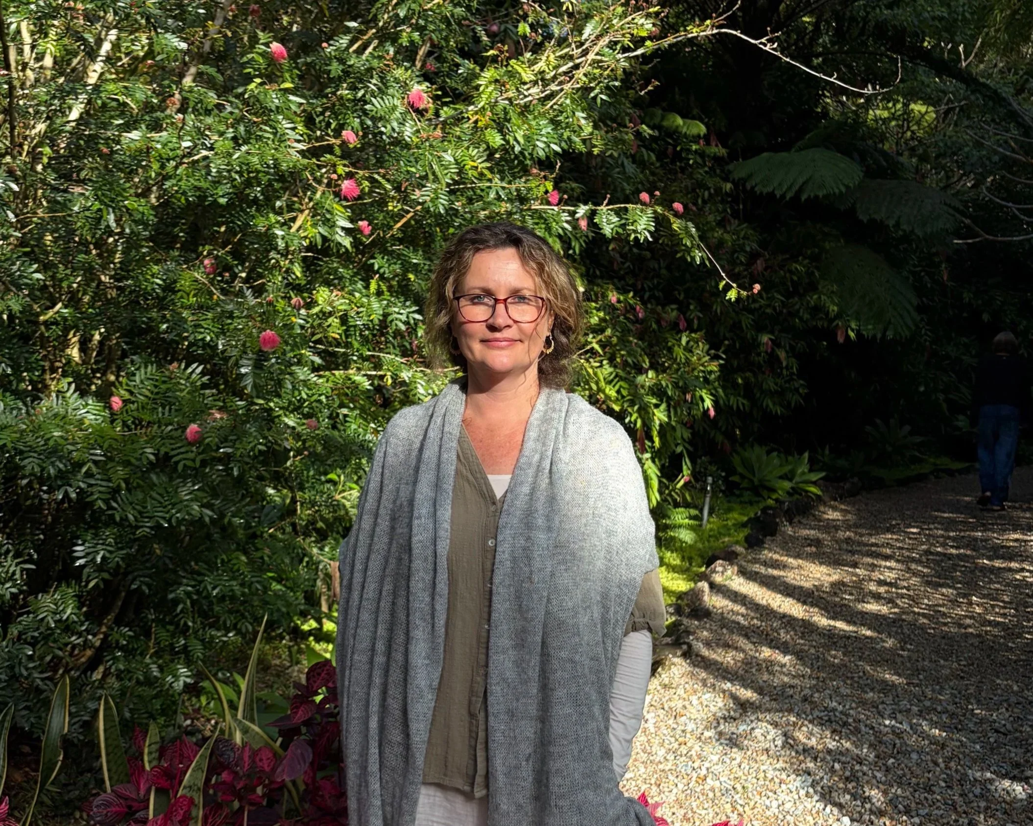 Natasha Kolas standing outside in a garden