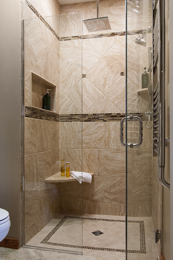 curbless shower with diagonal tile pattern