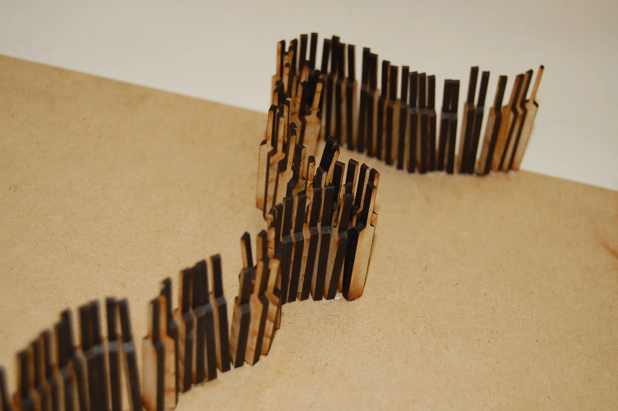 Close up of laser cut cricket bats on piece #2.