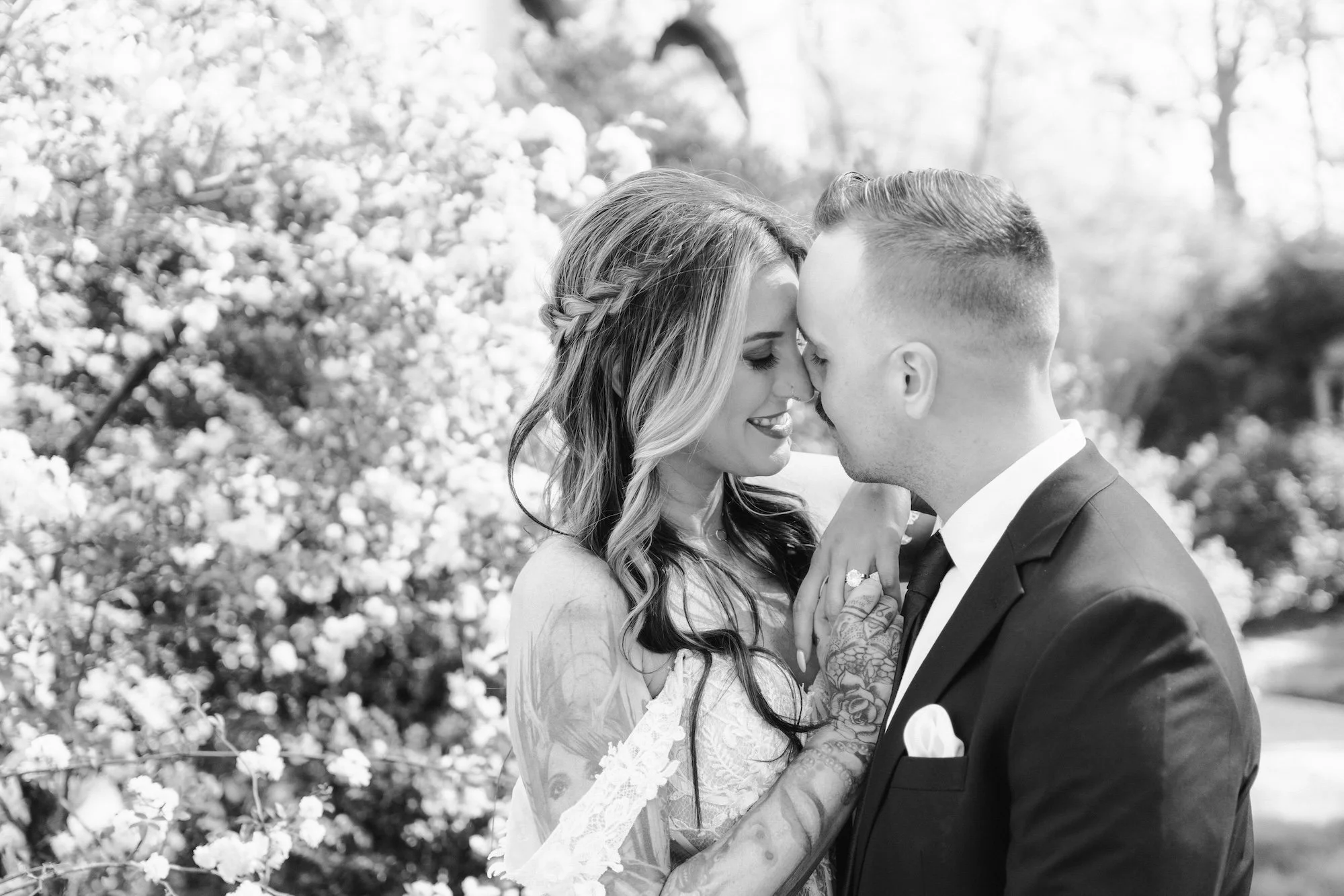 A kiss framed in timeless monochrome, cinematic portrait by Caz Isaiah, Best Bali Wedding Photographers