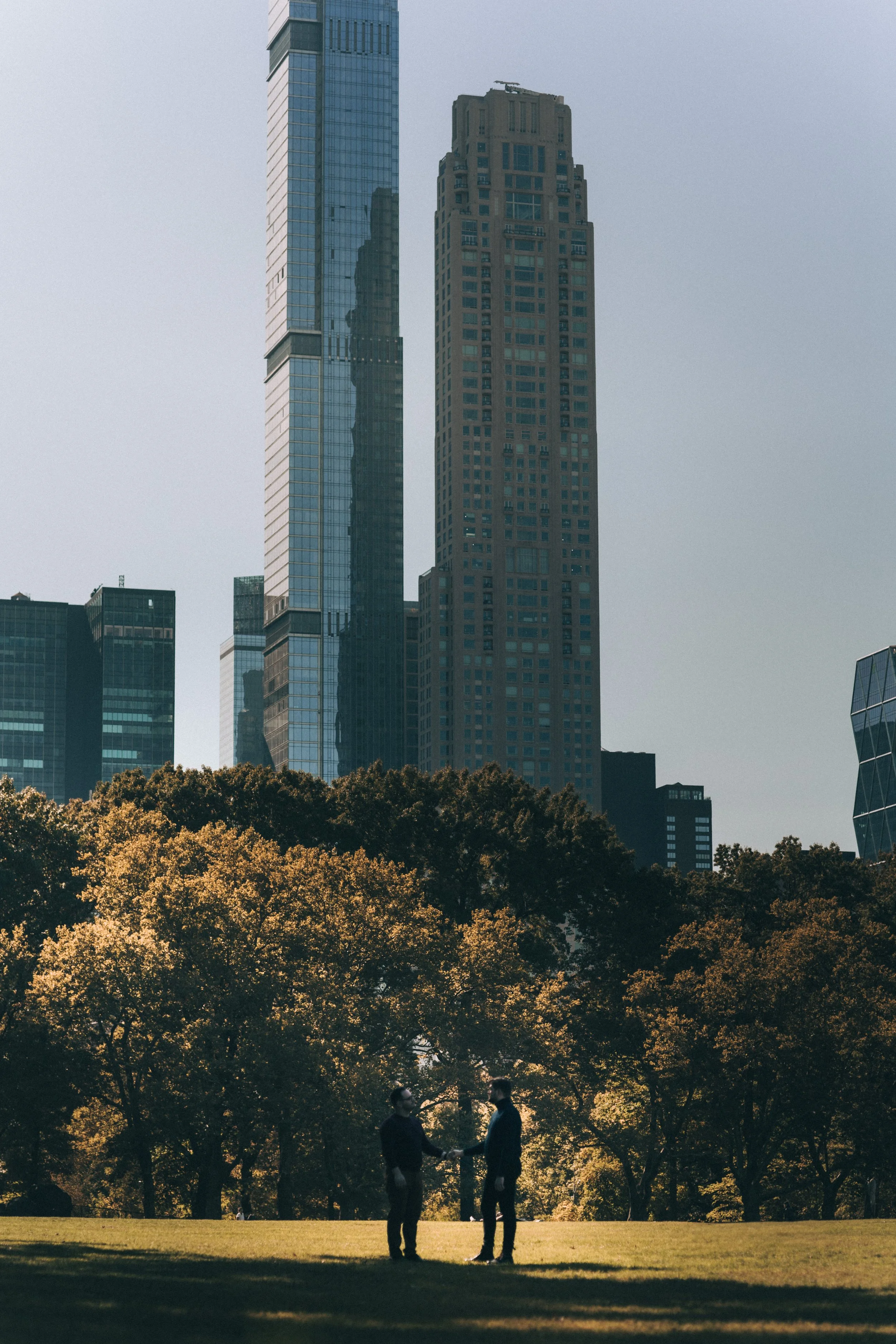 Manhattan skyline rising above fall colors in Central Park