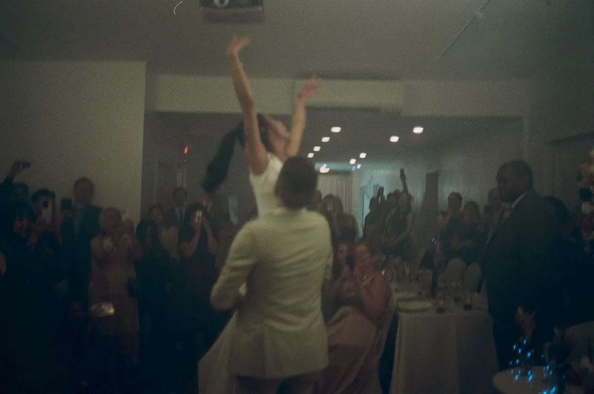 Bride cheering in reception