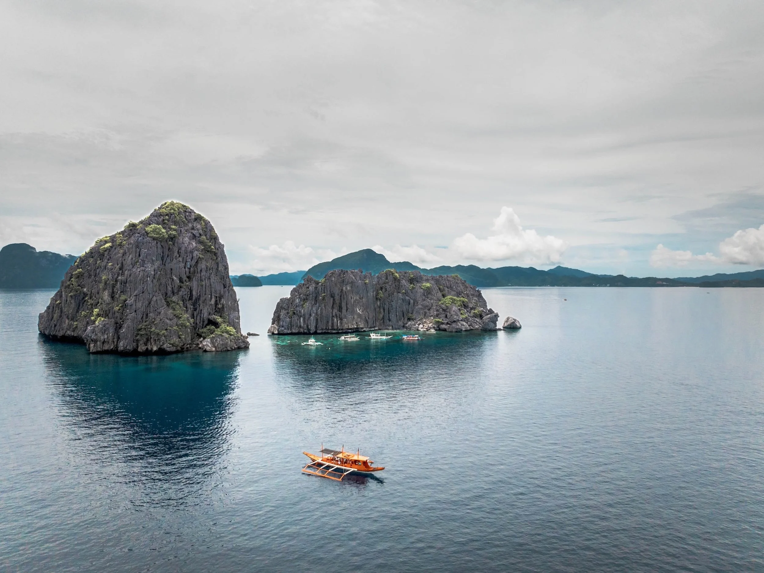 epic limestone cliffs in the ocean drone