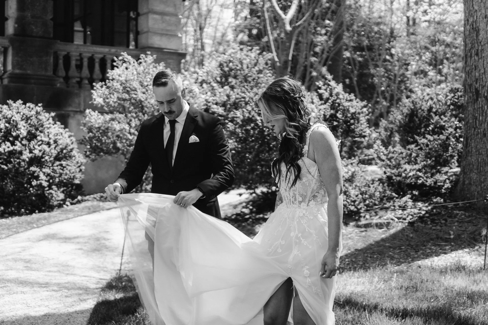 bw editorial style shot of wedding couple