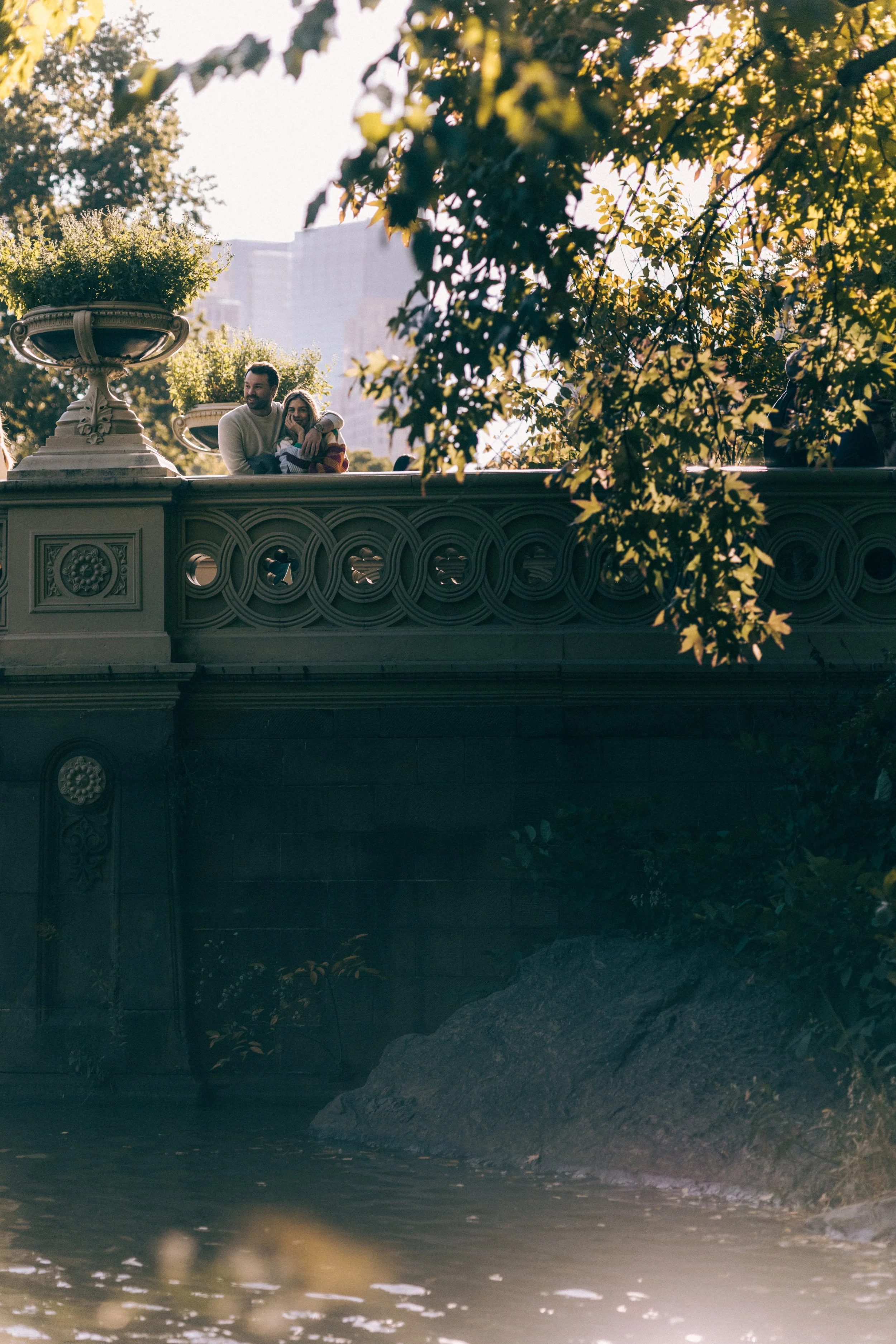 Architectural Detail – Romantic proposal captured near historic architecture · cinematic engagement moment.