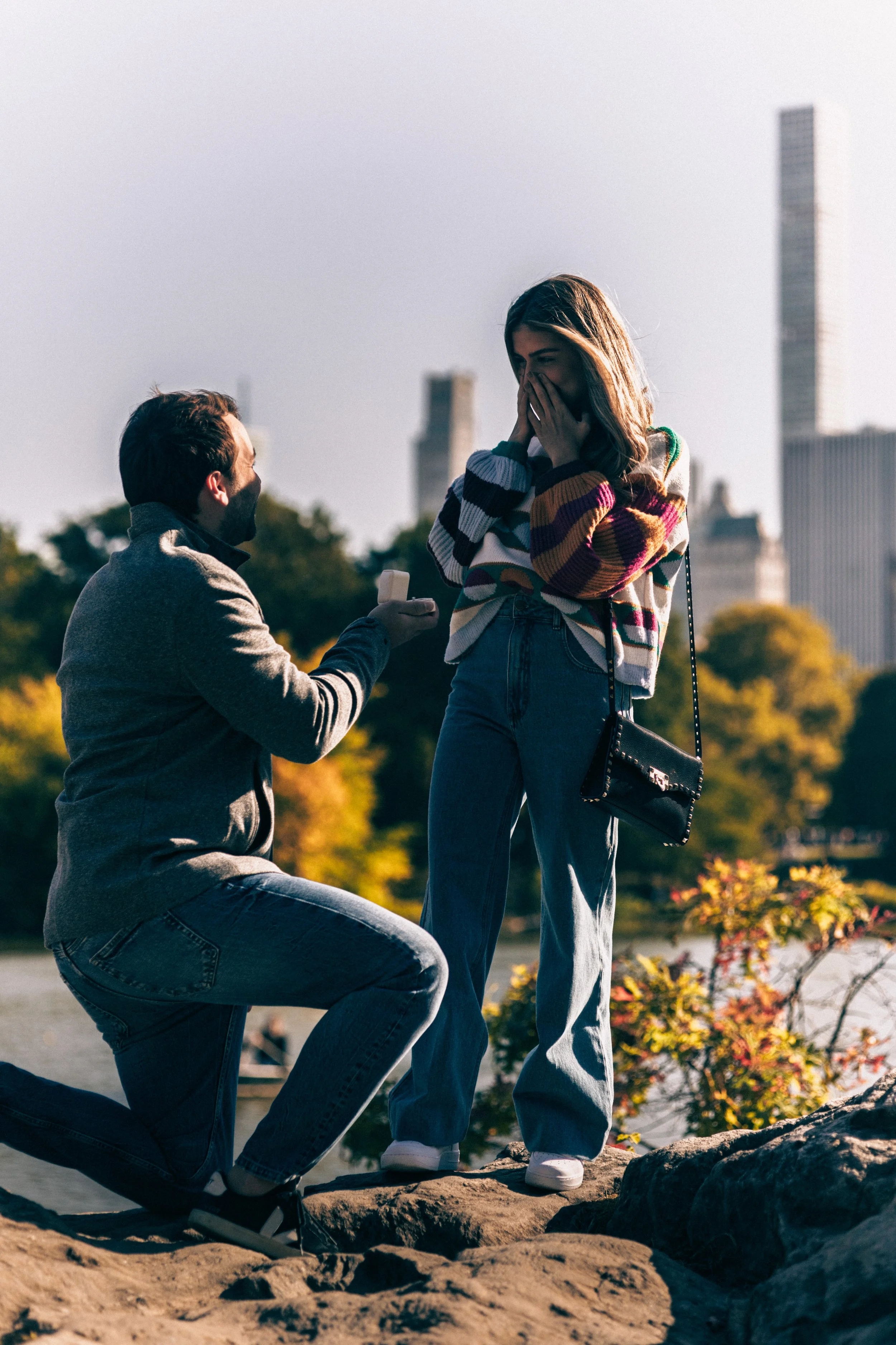 Surprise proposal at Top of the Rock — romantic moment overlooking the New York City skyline.