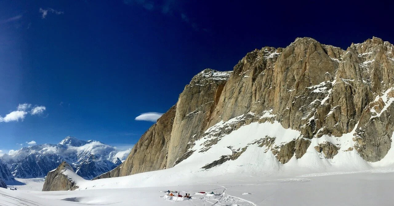 View of basecamp on the Root Canal with the Moose's Tooth towering above.