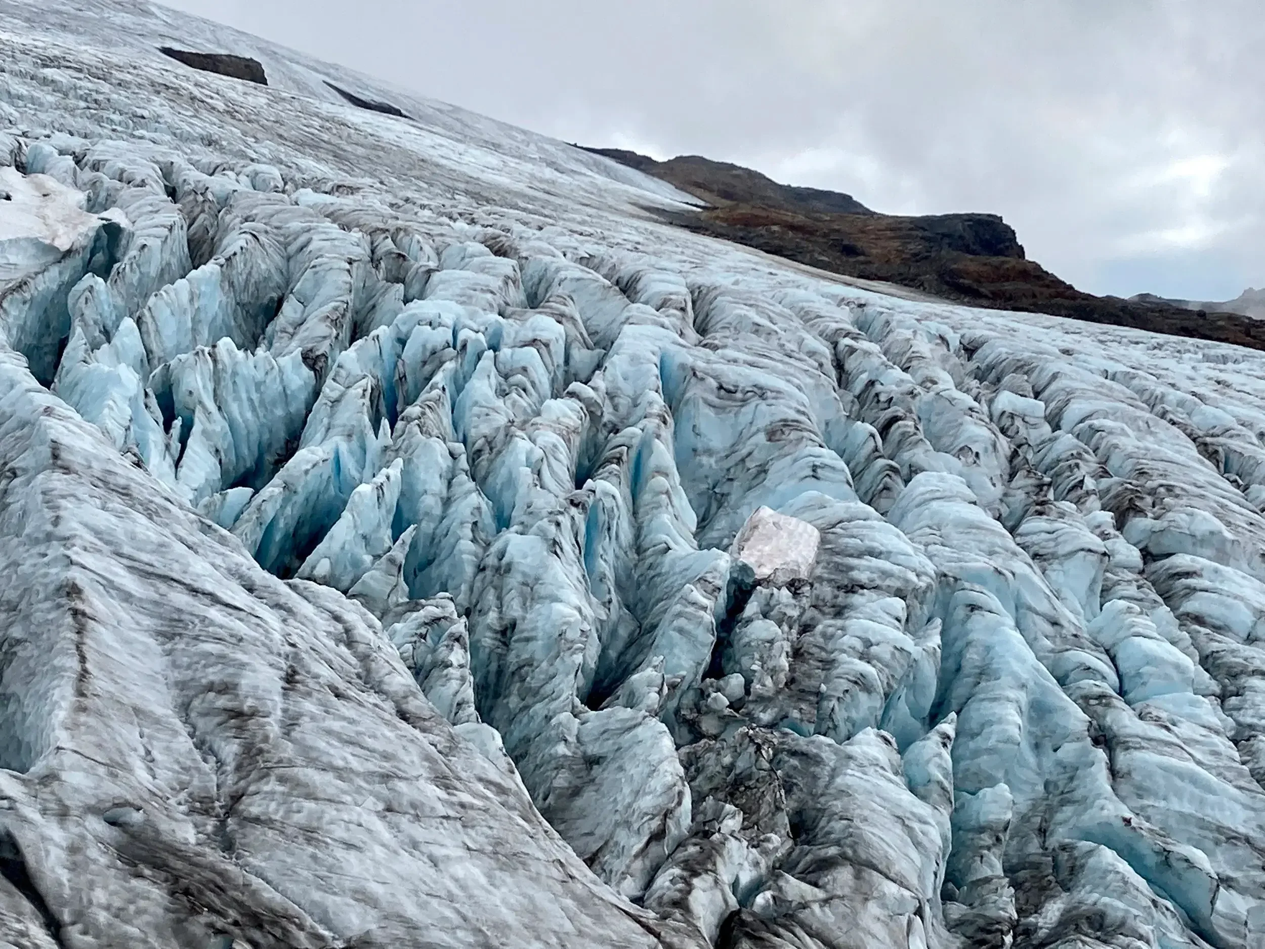 View of the broken lower section of the Easton Glacier during the late summer season.