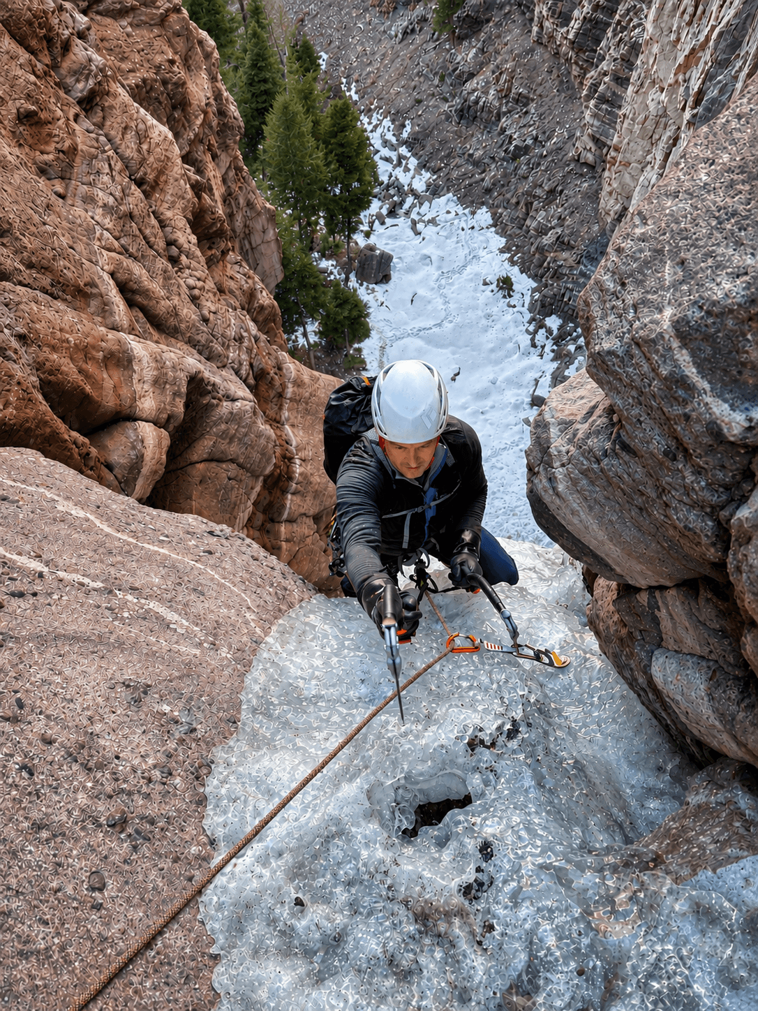 A climber swings his ice tools on the route, Charmin Tube, above Ouray, Colorado.