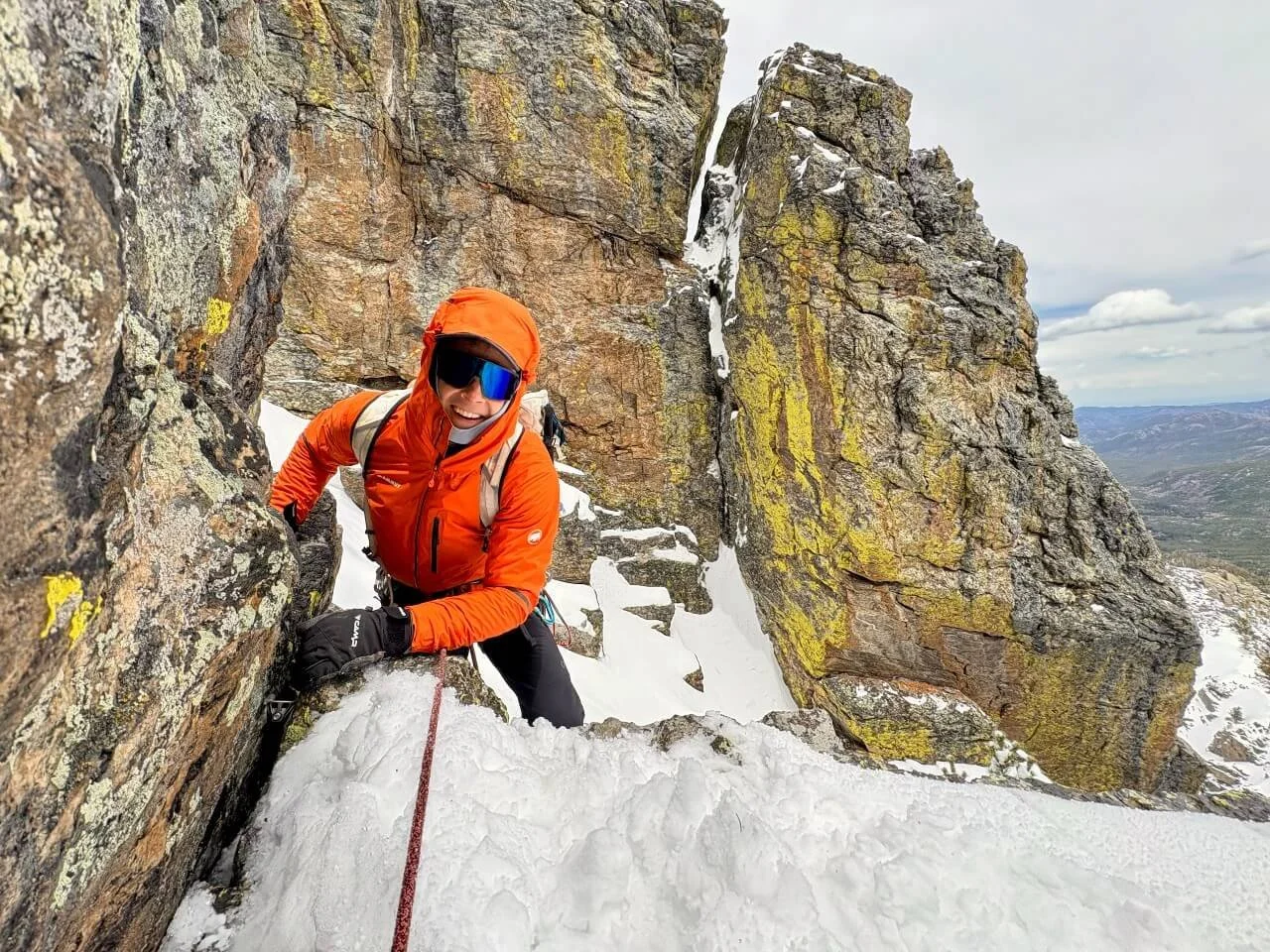 Climbing a snowy East Ridge during an early spring mixed climb of Hallett Peak.