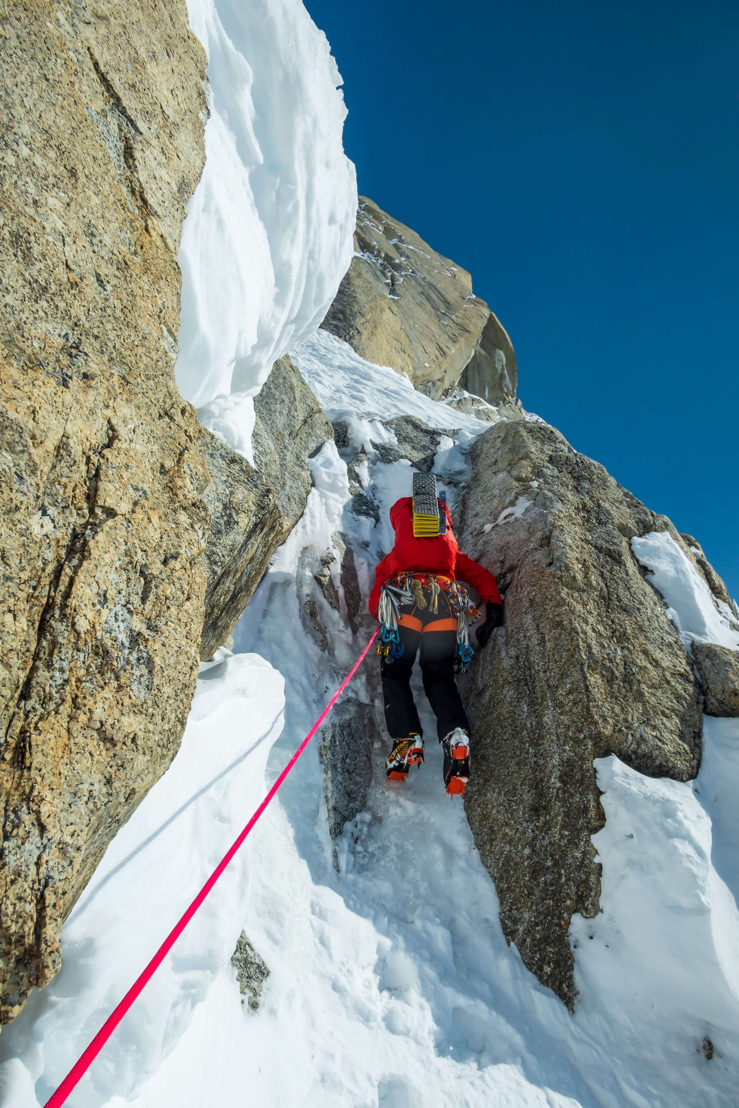 Climbing mixed steps on Mt. Huntington's Harvard Route.