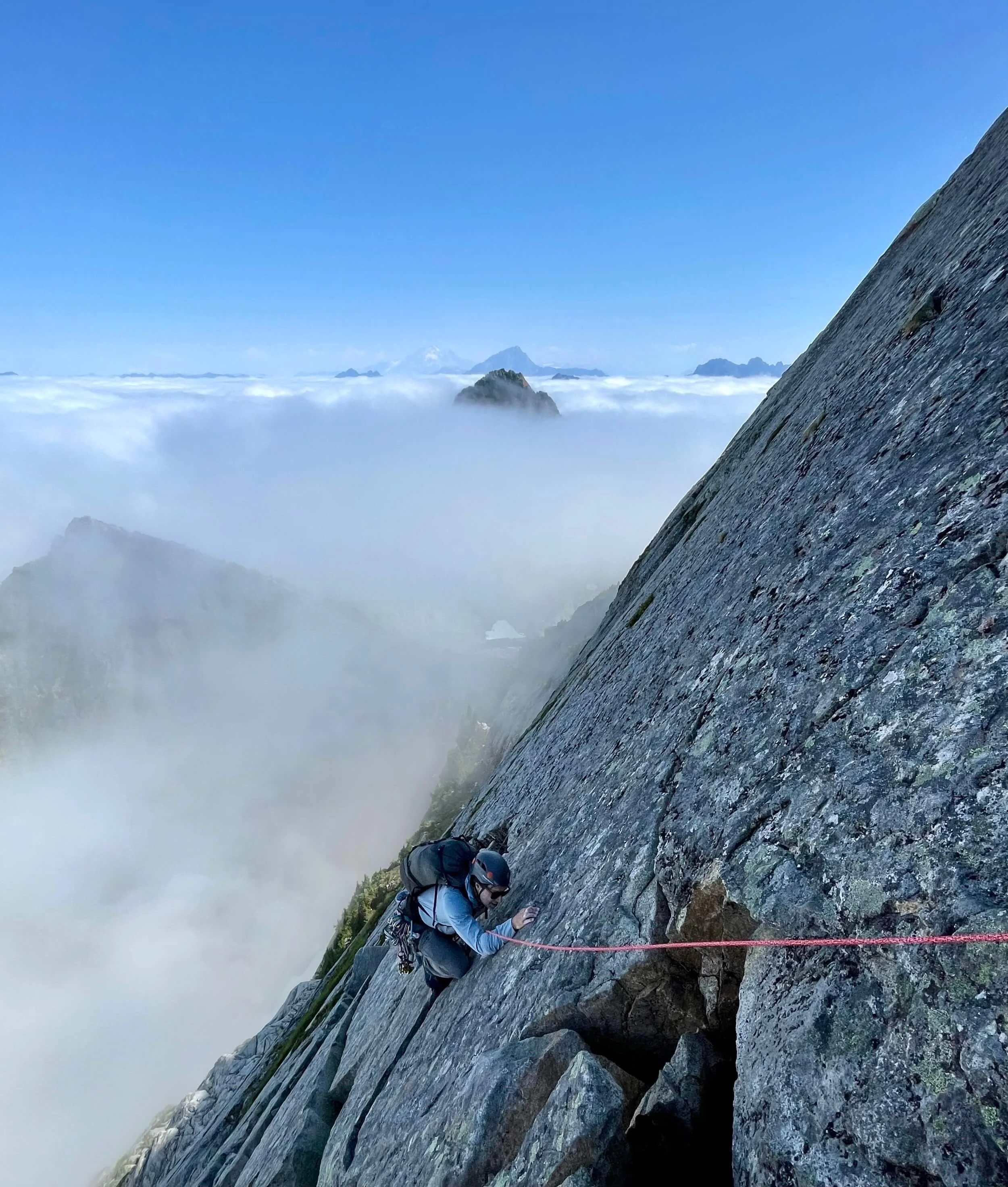 Traversing a flake system on Vesper Peak above a sea of clouds.