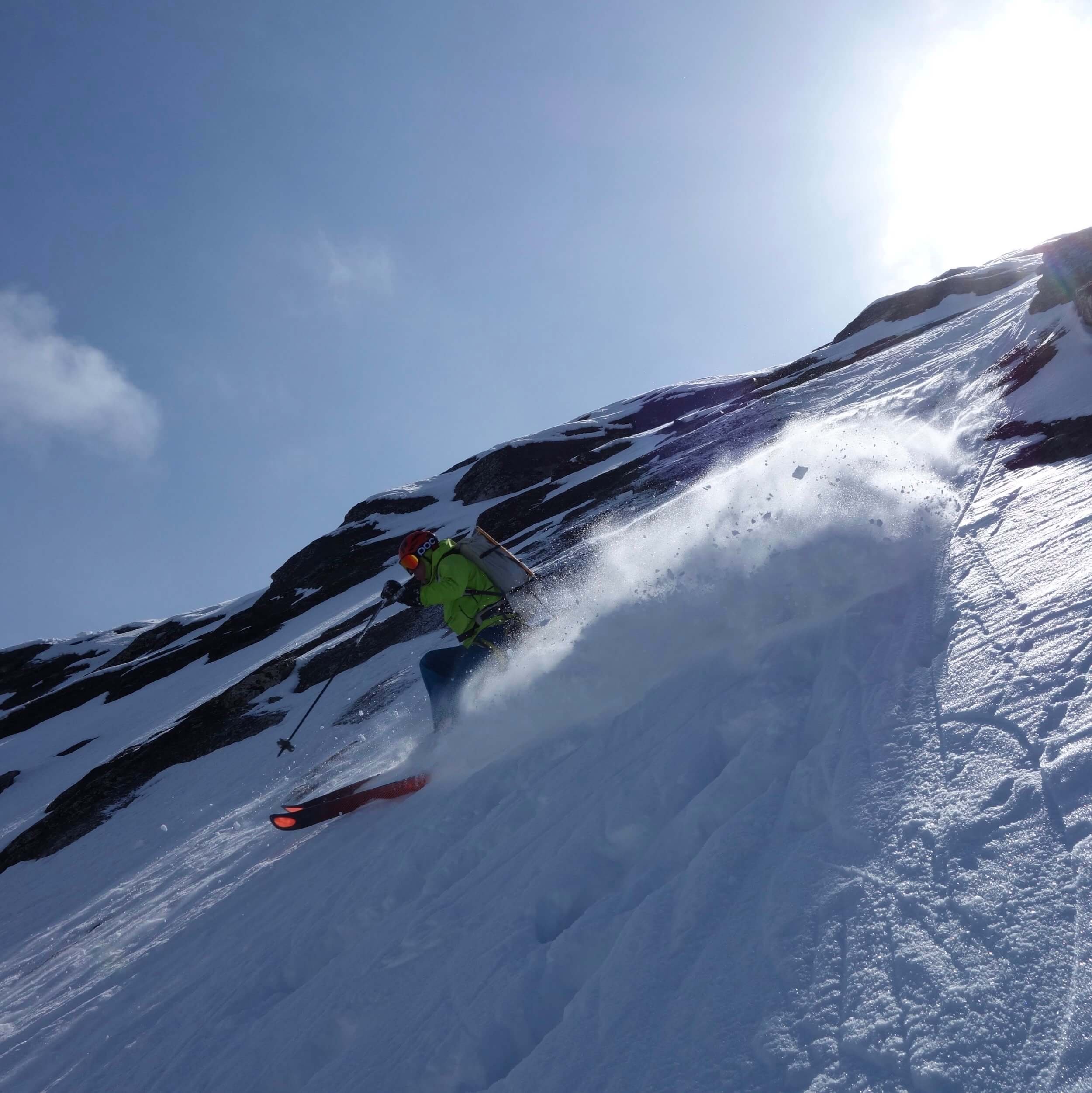 Skiing a steep face in the San Juan mountains.
