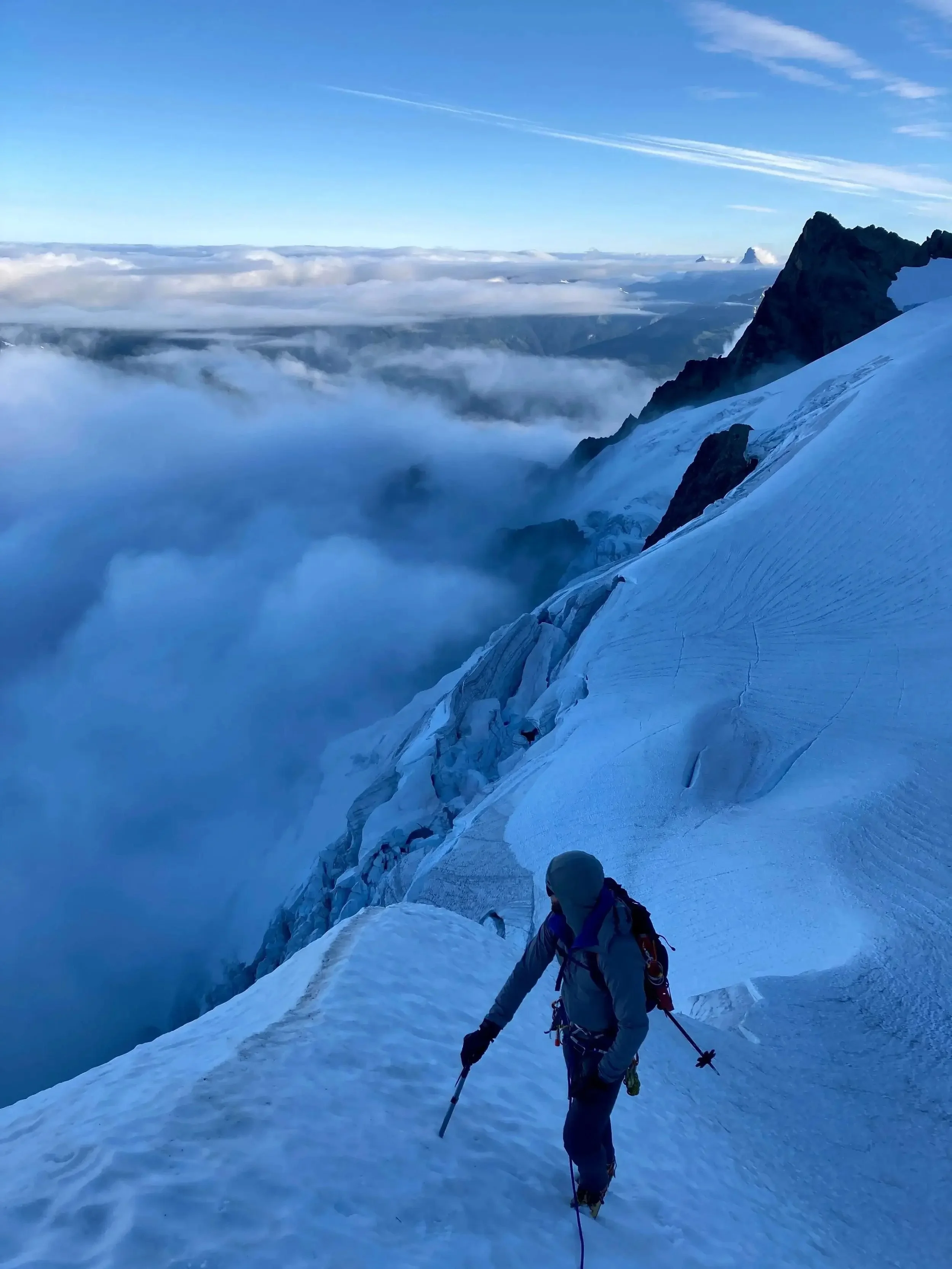 Sunrise climbing above Hells Highway on Mt. Shuksan's Fisher Chimneys.