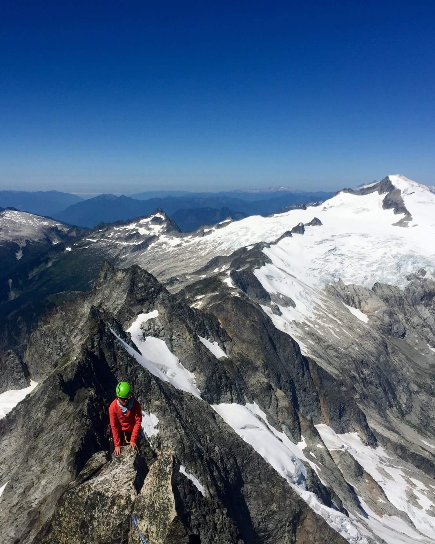 Climbing up the knife edge West Ridge of Forbidden Peak.