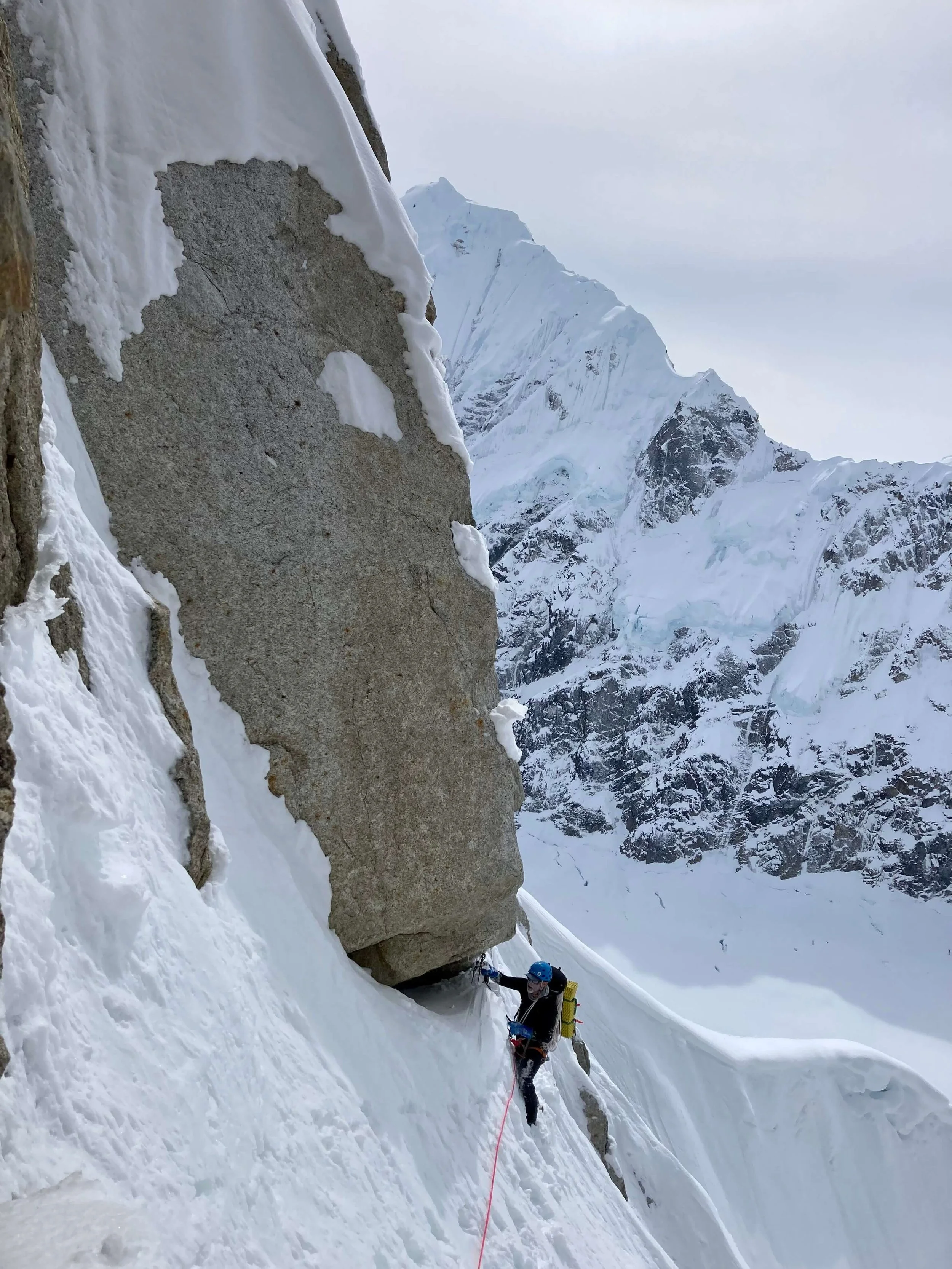 Traversing into the S-Couloir below the Grey Rock bivy on the Southwest Ridge of Peak 11,300.