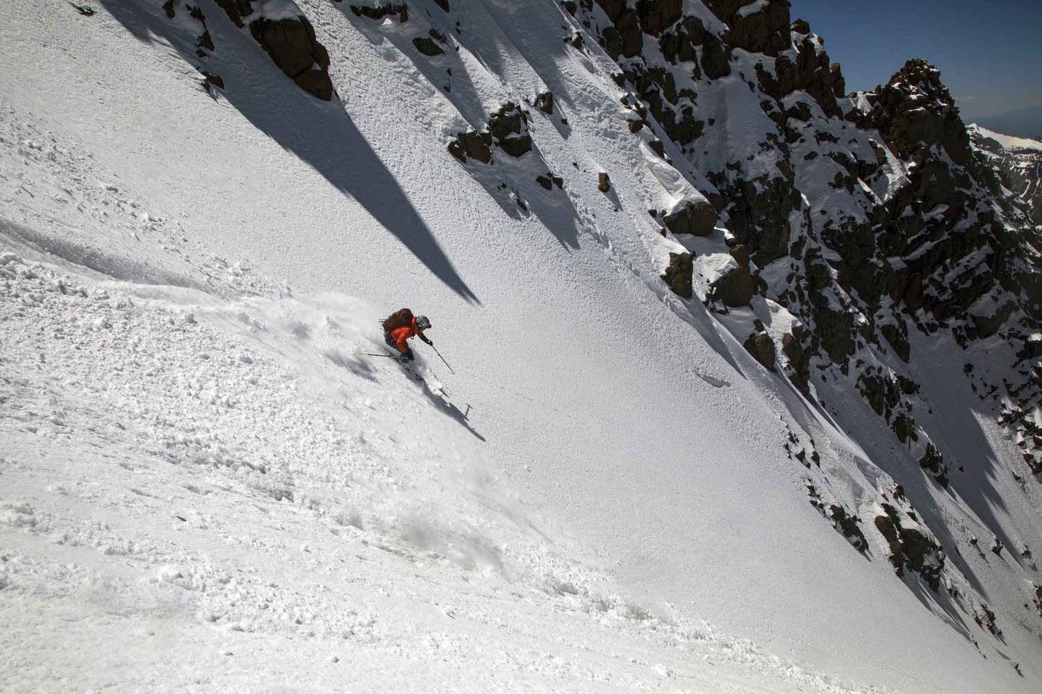 Skiing a steep couloir in the San Juan mountains.