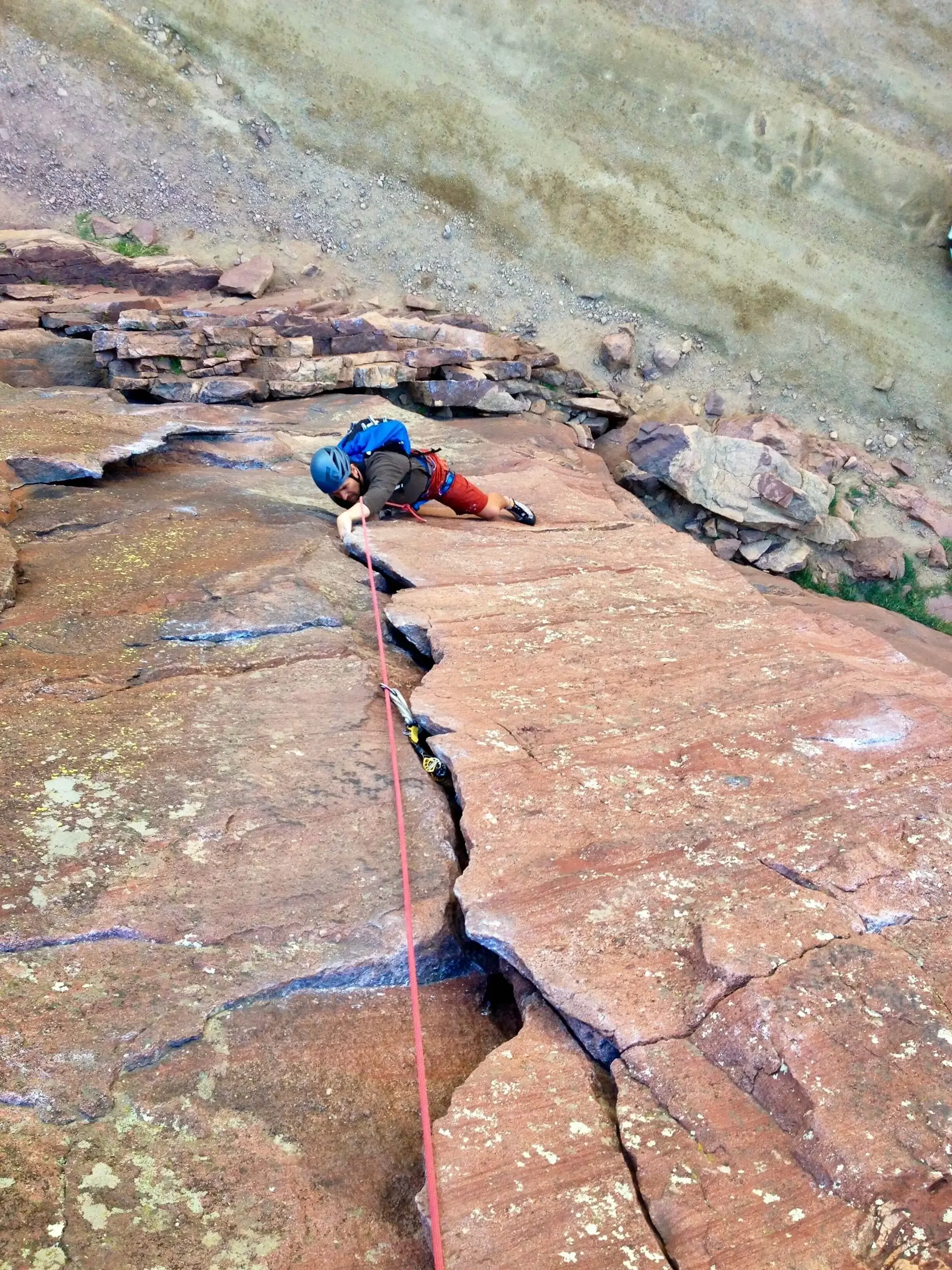 A climber follows the ultra-classic Bastille Crack in Eldorado Canyon.