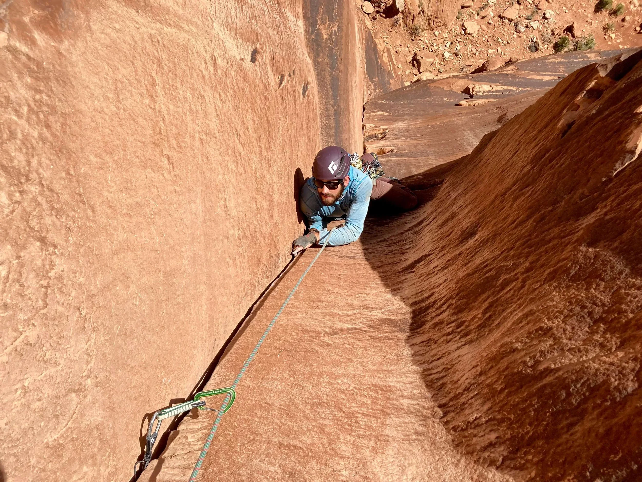 Climbing up the first pitch of Get A Life, a very challenging route in Colorado National Monument.
