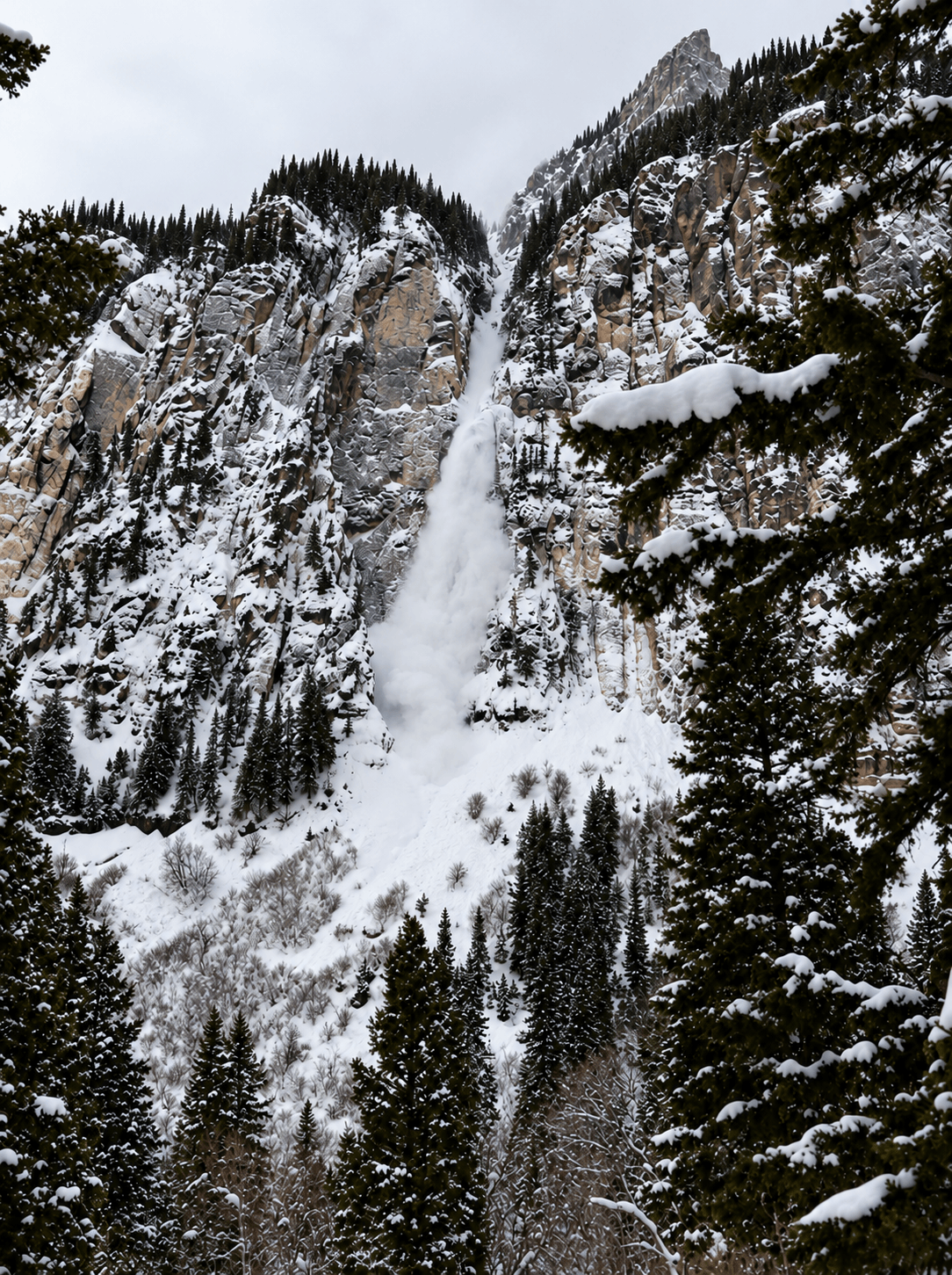 A loose avalanche on the classic Ouray ice climbing route, The Ribbon.