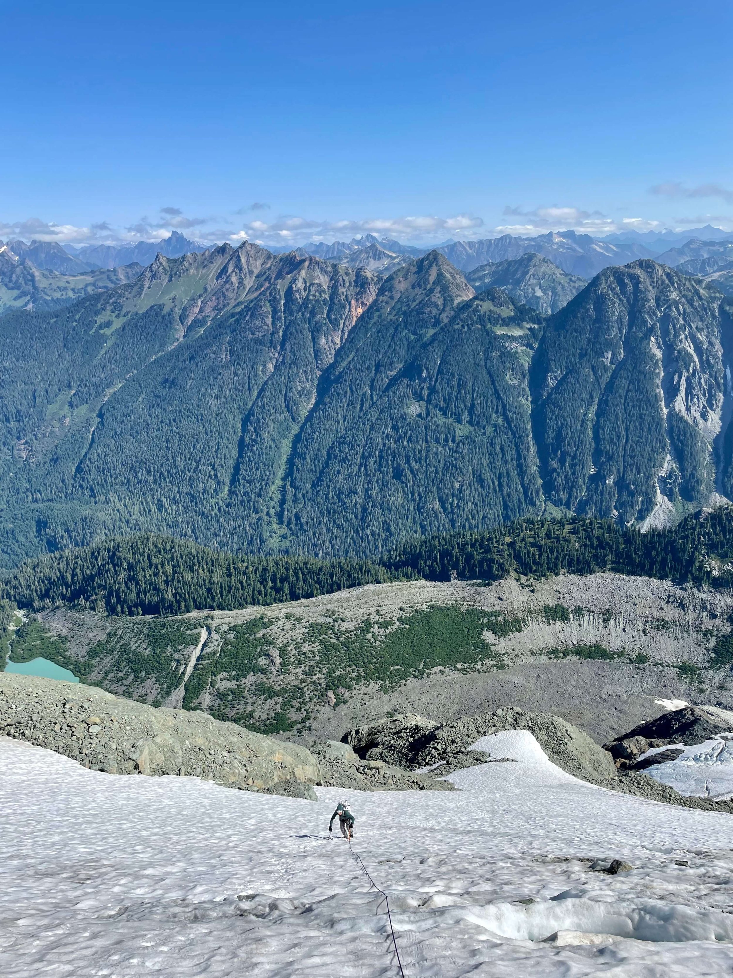Climbing steep snow and ice on the North Face of Mt. Shuksan.