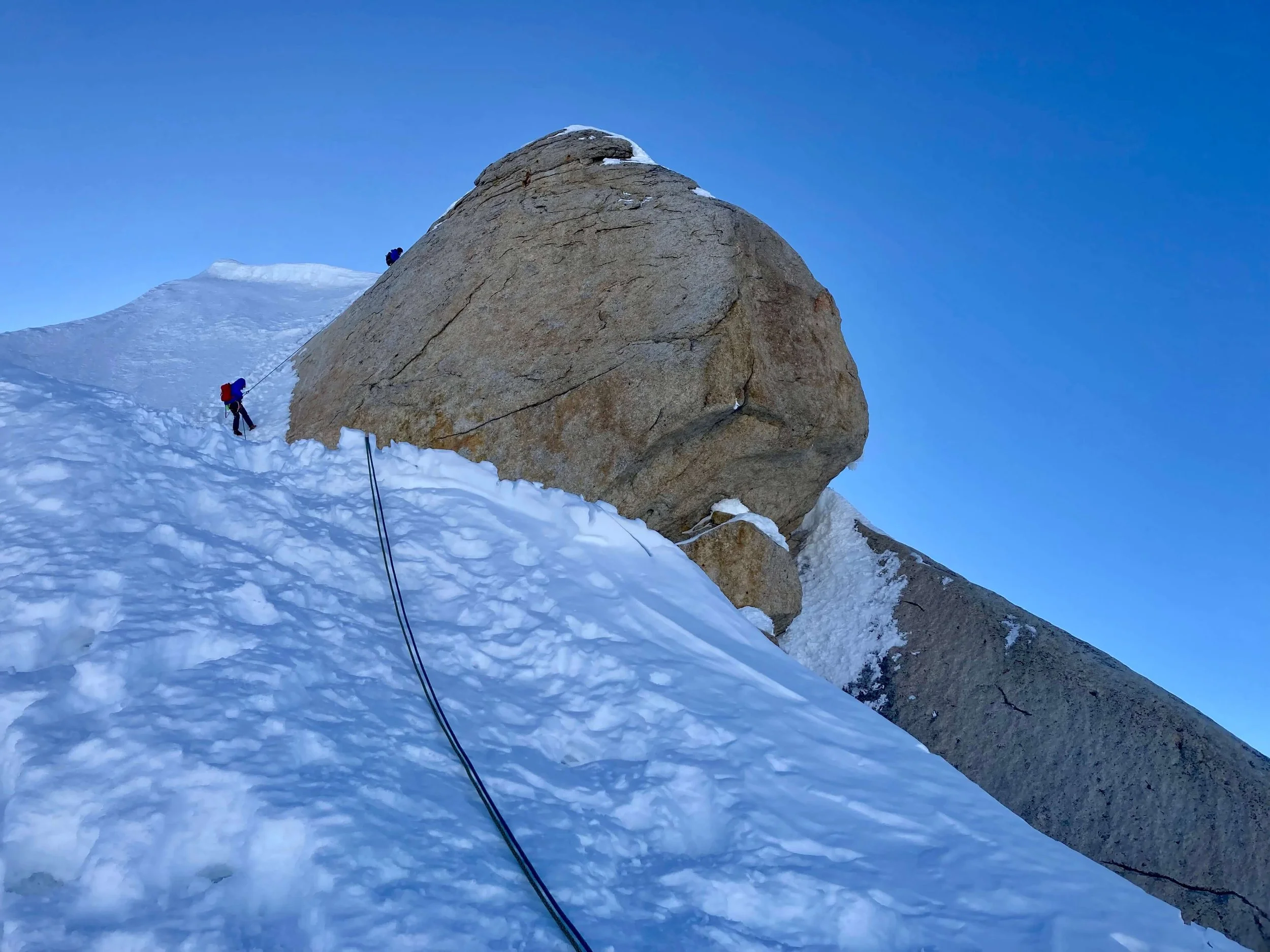 Rappelling from the summit of the Moose's Tooth.