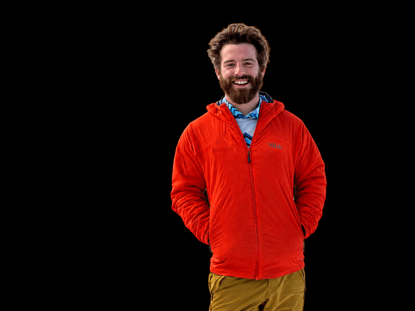 Skyward Mountaineering, Nico Leis, he is wearing a red jacket.