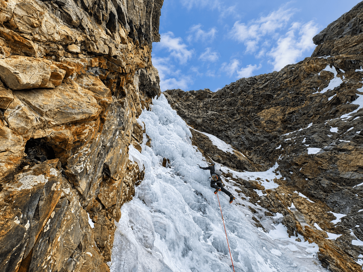A guide leads the summit pitch of Highway To Hell in Eureka, outside of Silverton, Colorado.