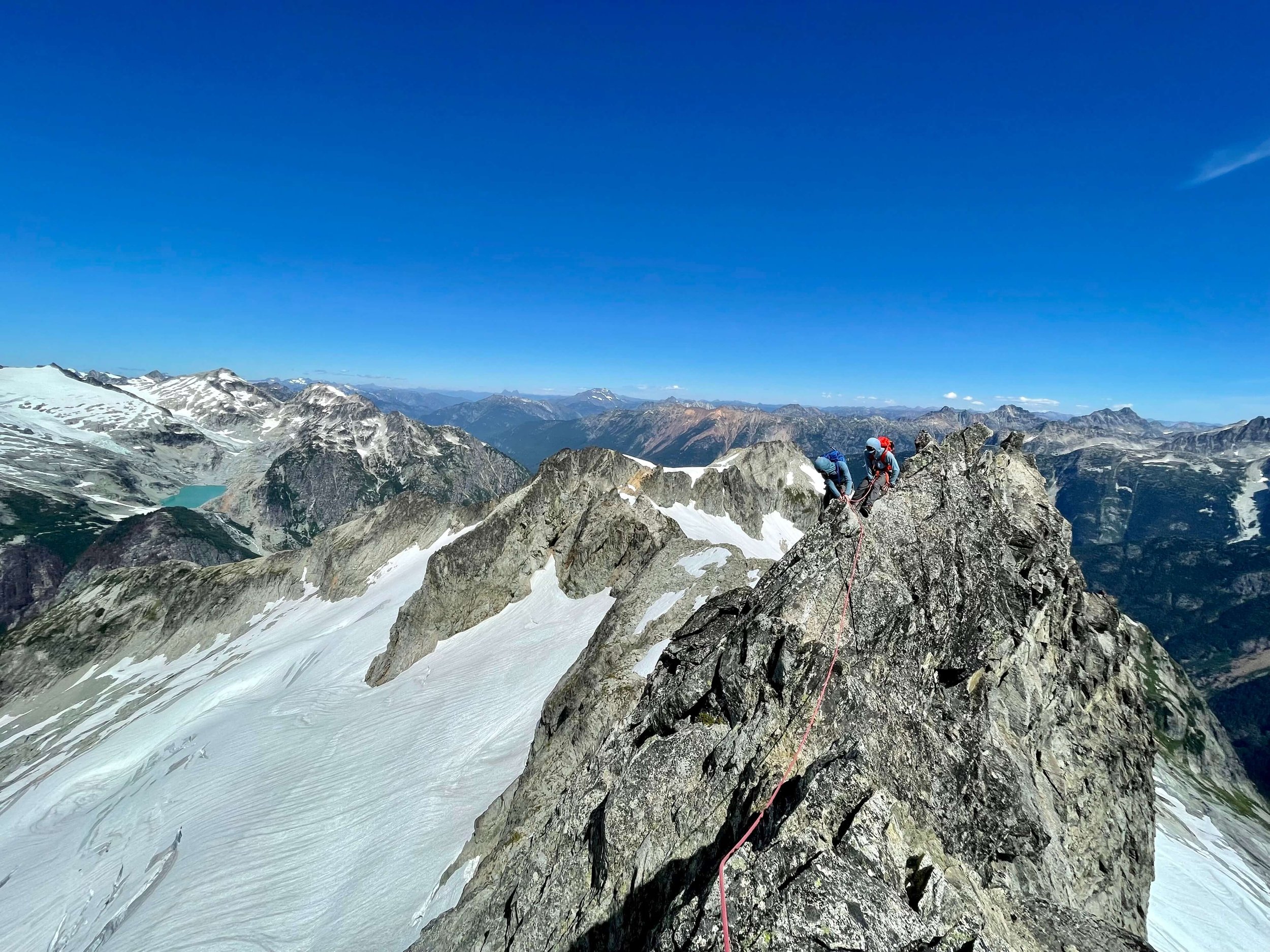 Traversing the exposed North Ridge of Forbidden Peak.