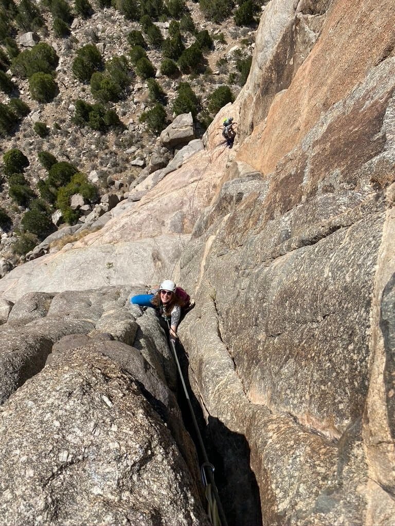 Climbing a multipitch route on the granite in Unaweep Canyon.