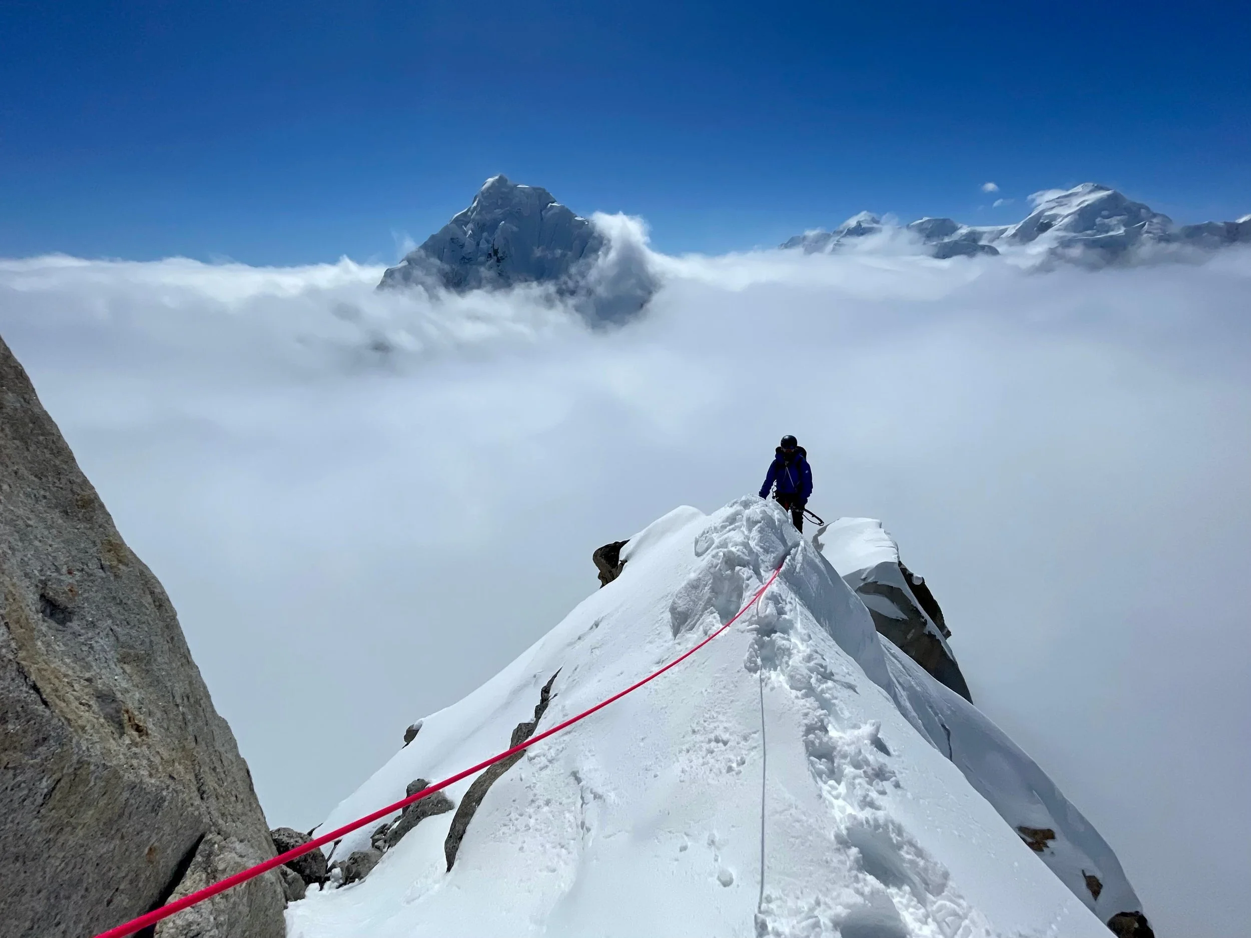 Traversing a snow arete high on the Southwest Ridge of Peak 11,300.