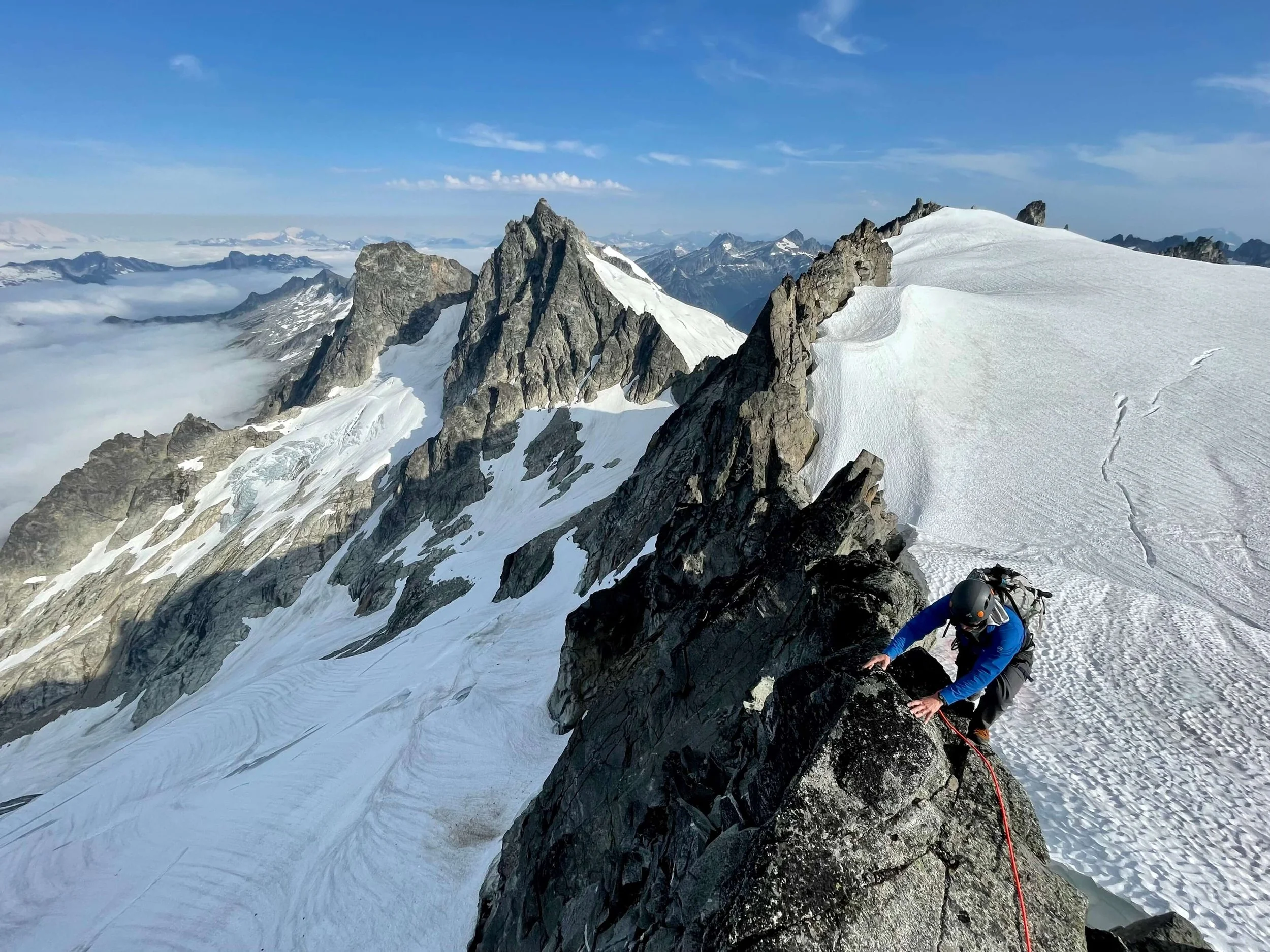Climbing the North Ridge of Eldorado Peak with Dorado Needle in the background.