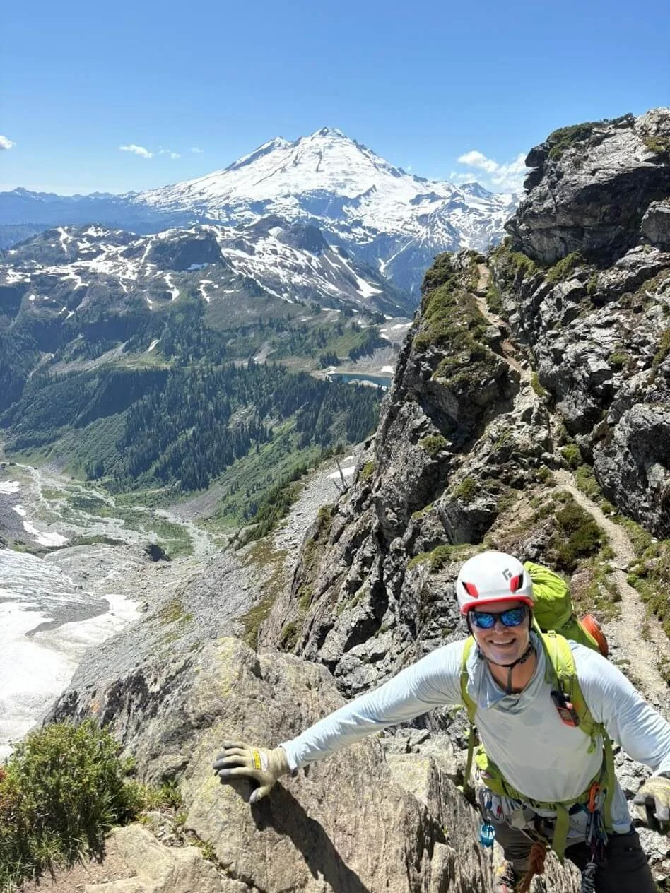 Traversing narrow trails on Mount Shuksan's Fisher Chimneys.