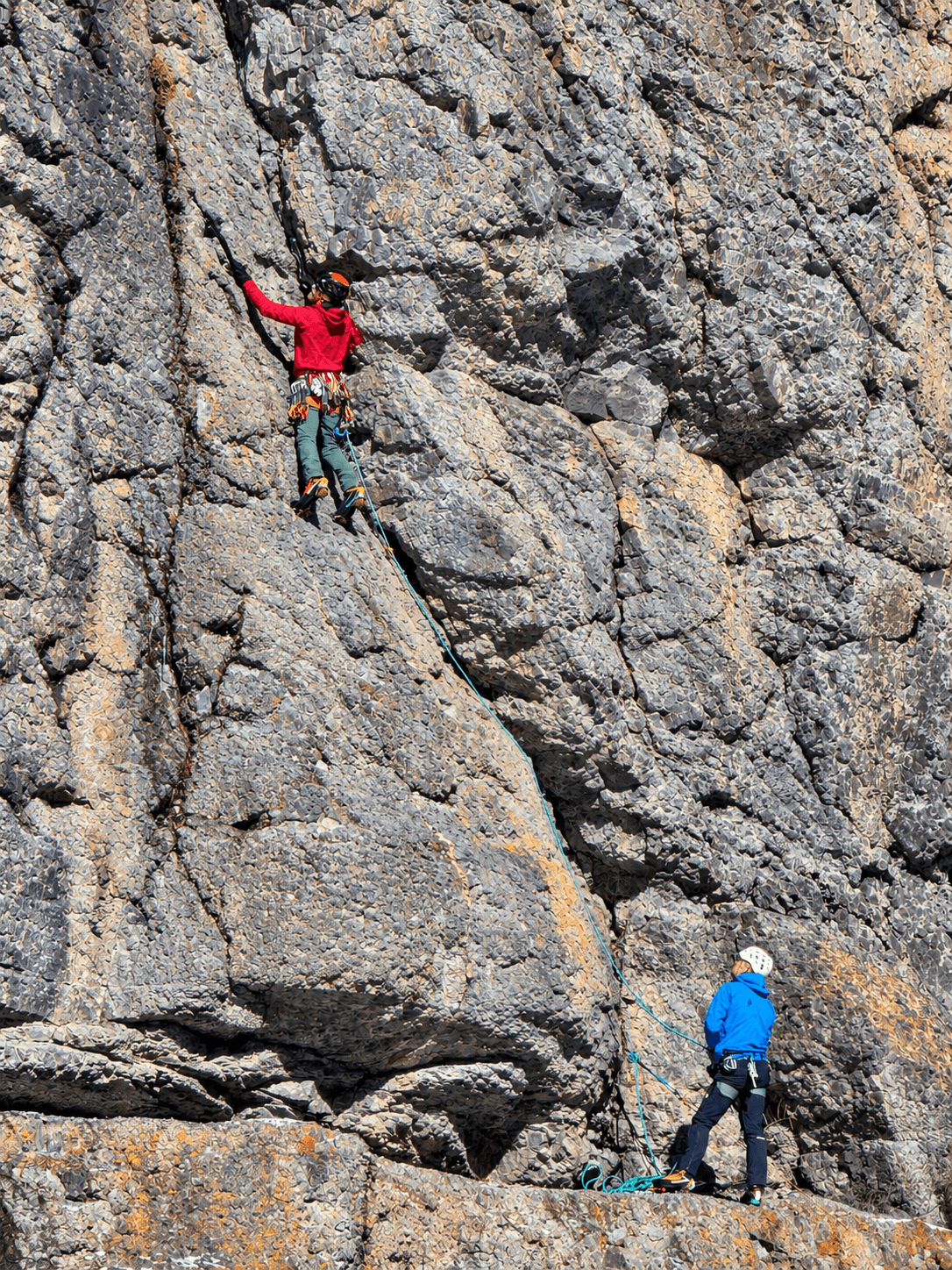 A guide leads a drytooling route during a mixed climbing course in Ouray, Colorado.