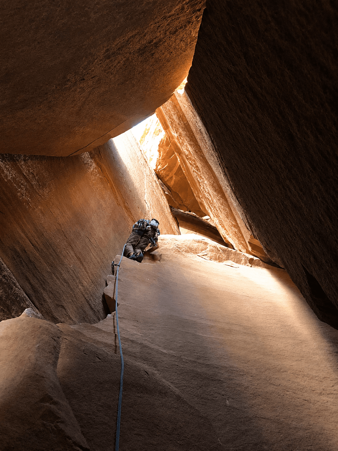 A climber leads a crack at the Interiors Wall in Escalante Canyon.