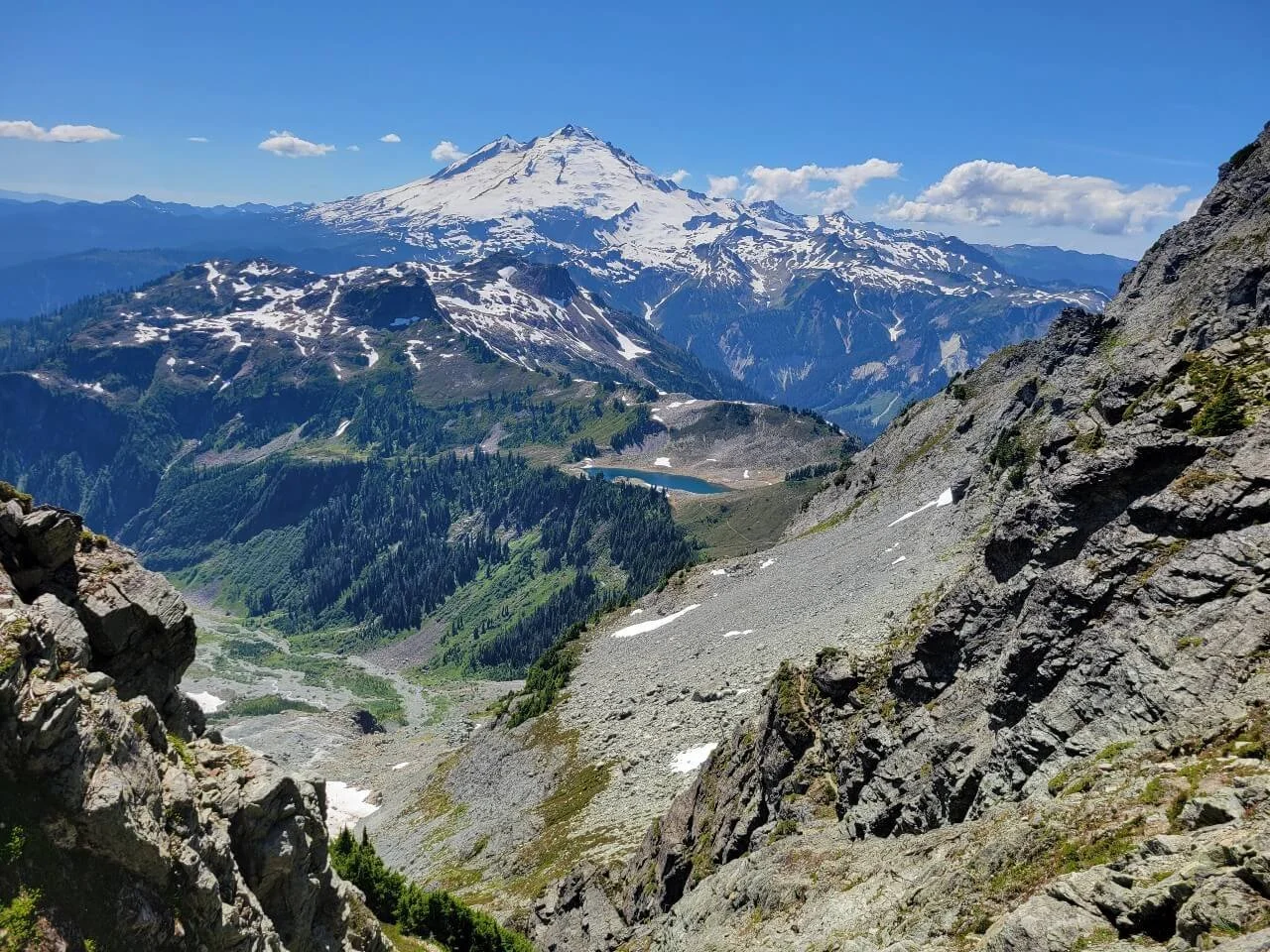 Looking out at Mount Baker from the Fisher Chimneys on Mount Shuksan.