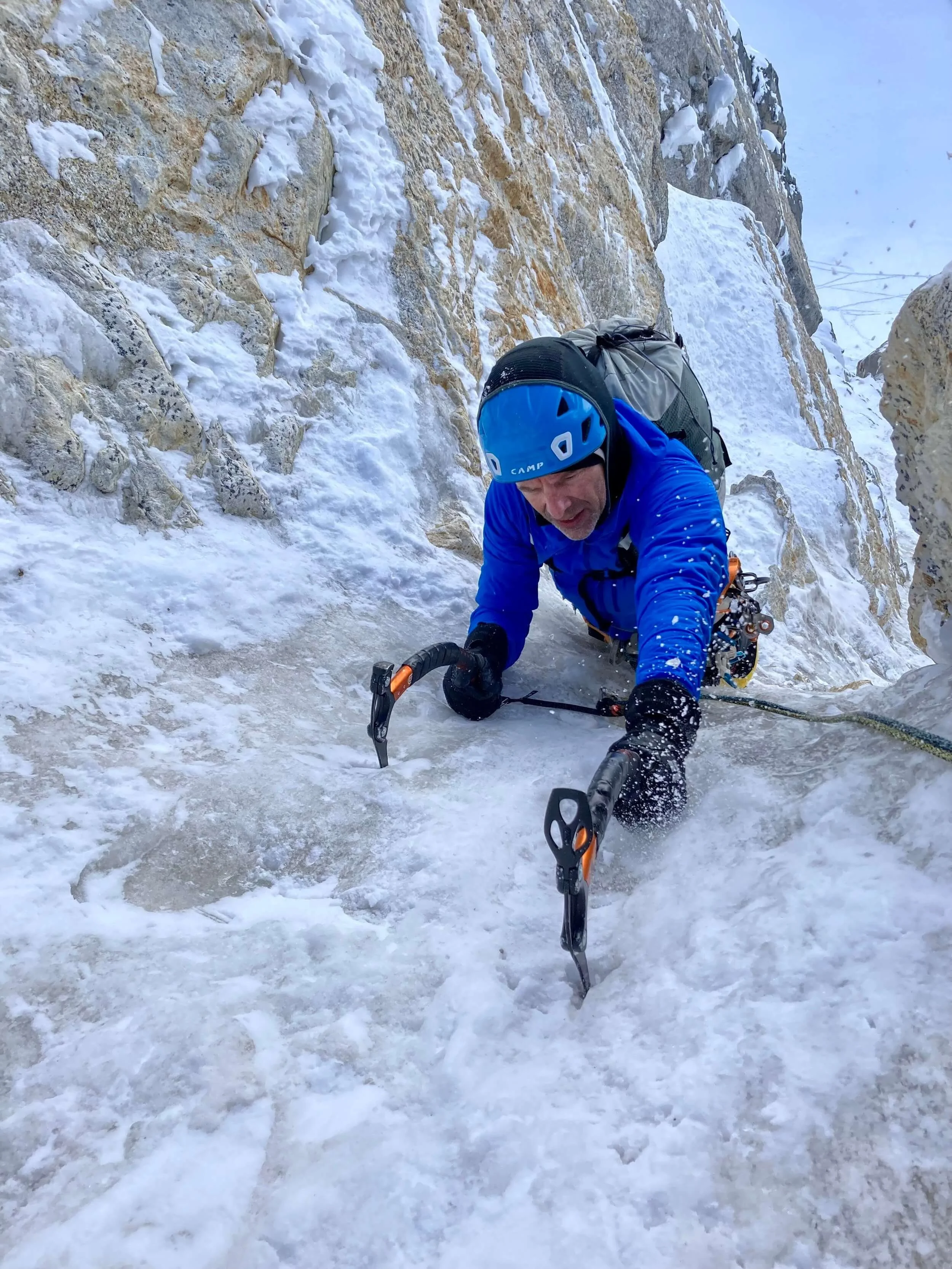 Climbing up the crux ice pitch of Bacon and Eggs on the Mini-Mini Moonflower.