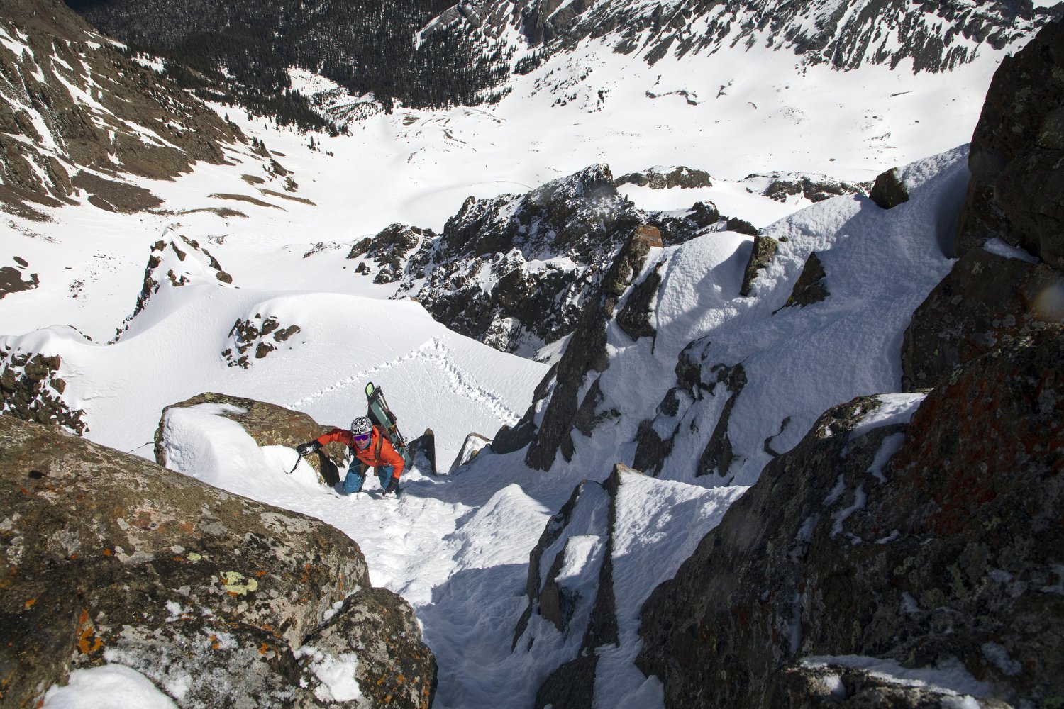 Climbing steep snow and moderate rock to the summit of Mt. Sneffels.