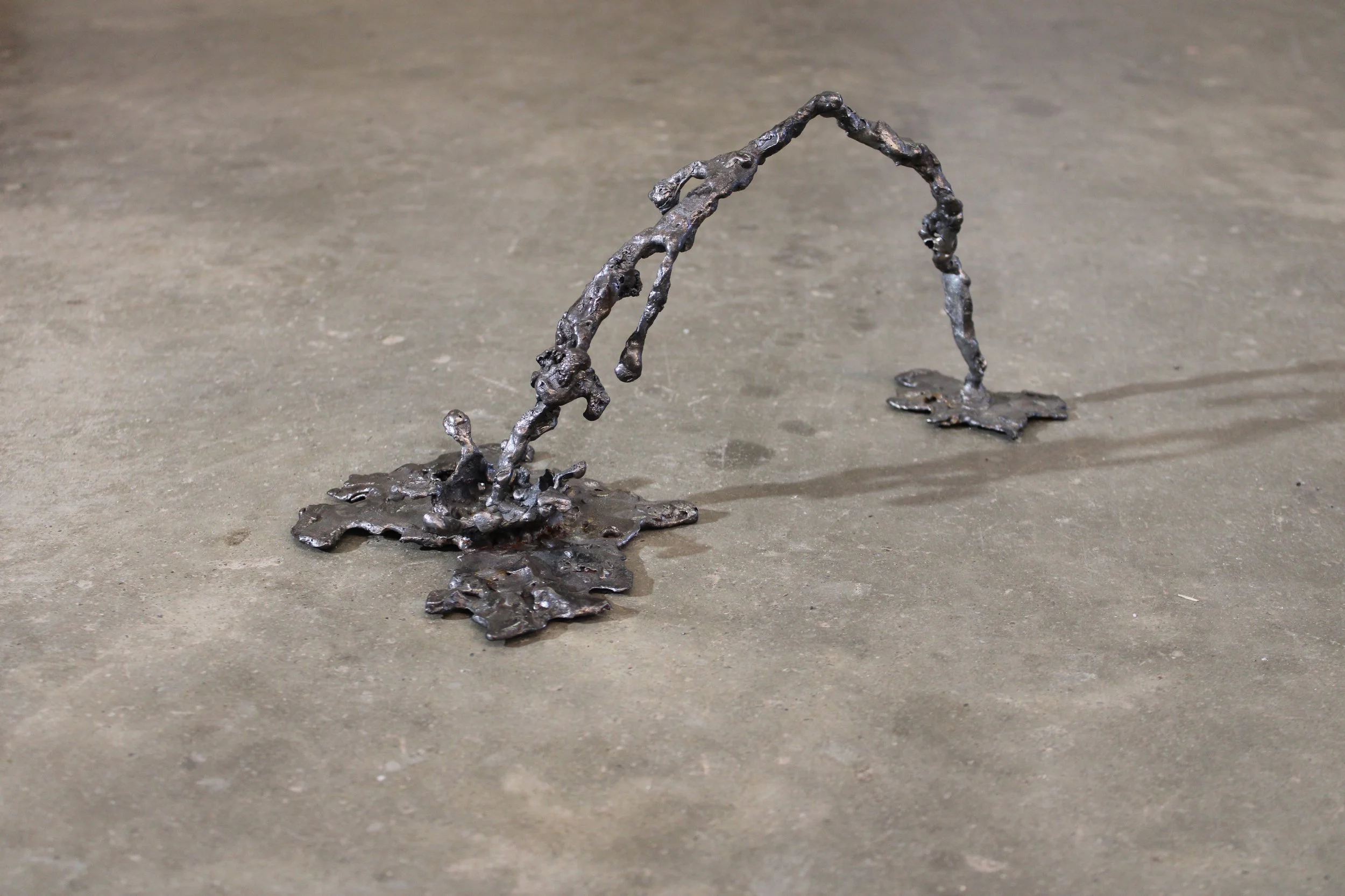 Aida Lodge - Transmutation (accepted routes from there to here), 2025, 6 x 12.5 x 6 in, heat-formed steel 