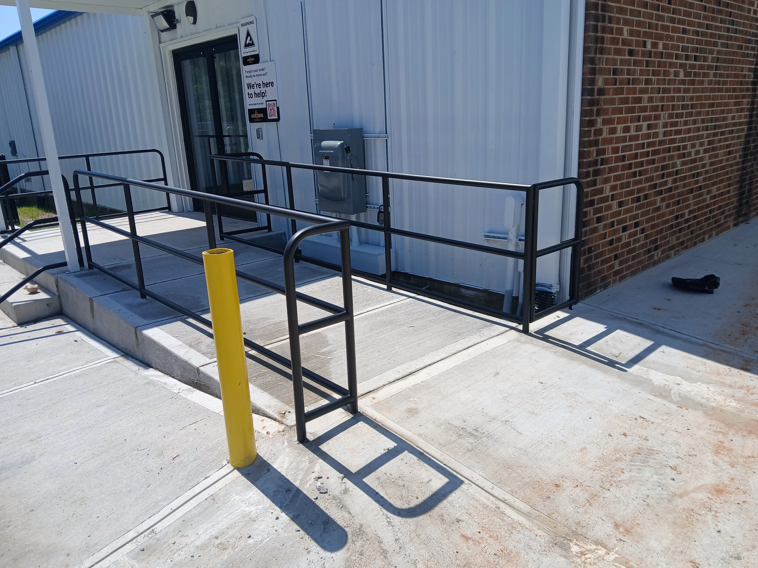 Steel code required rails with removeable section for electrical panel access.