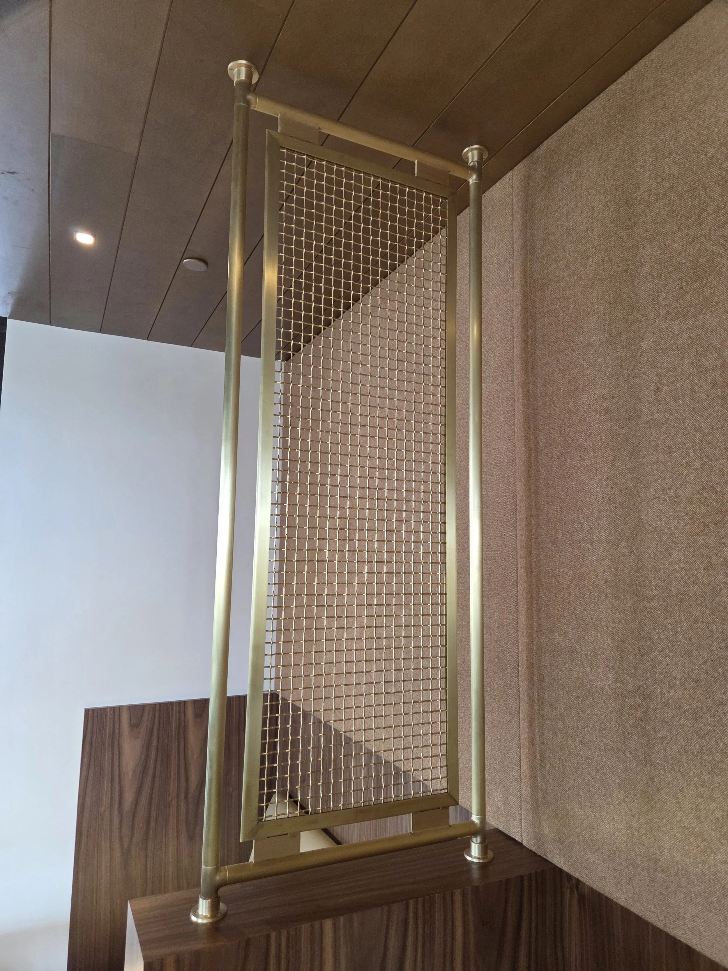 Decorative brass divider screens.