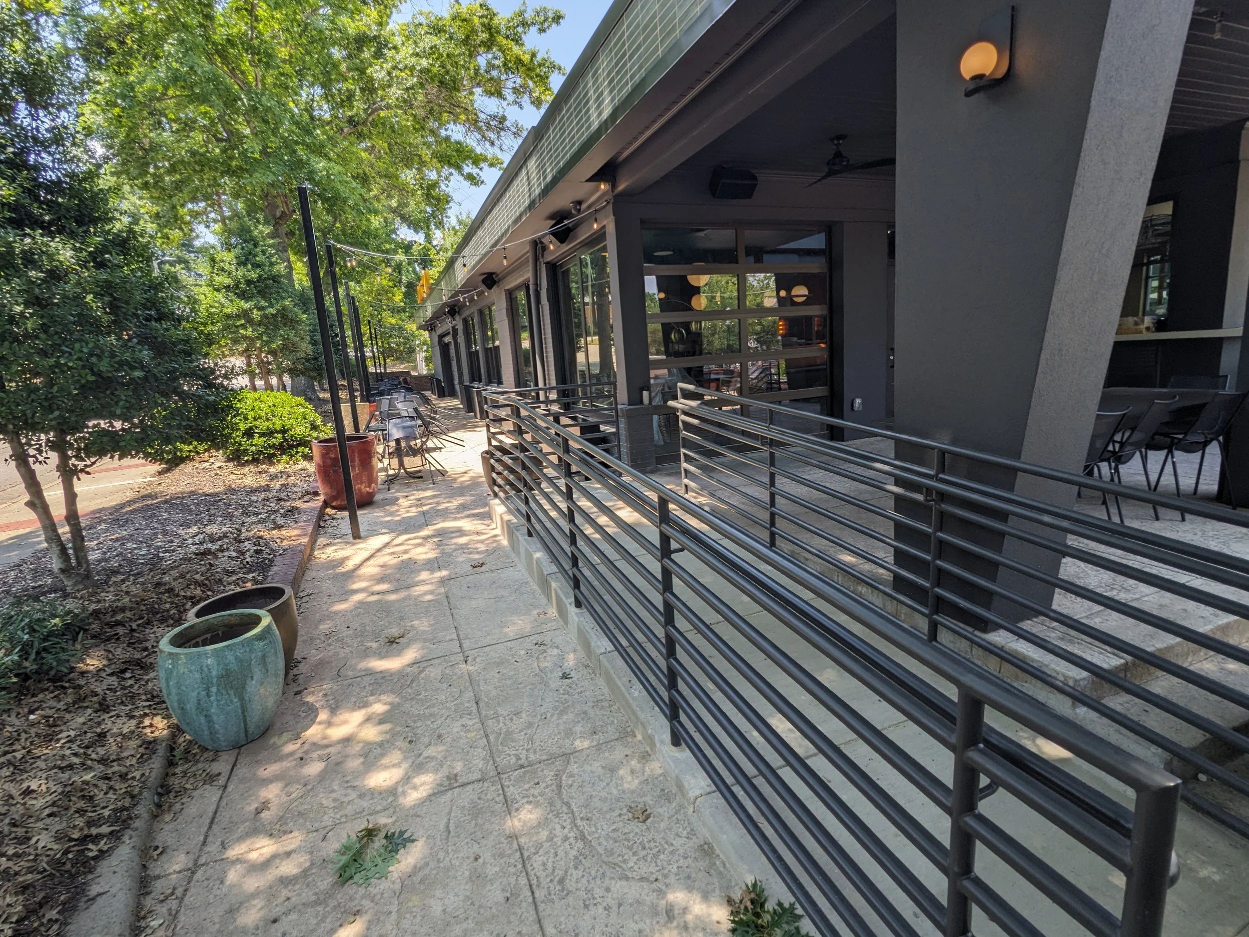 Decorative steel code required rails at Postino in Raleigh