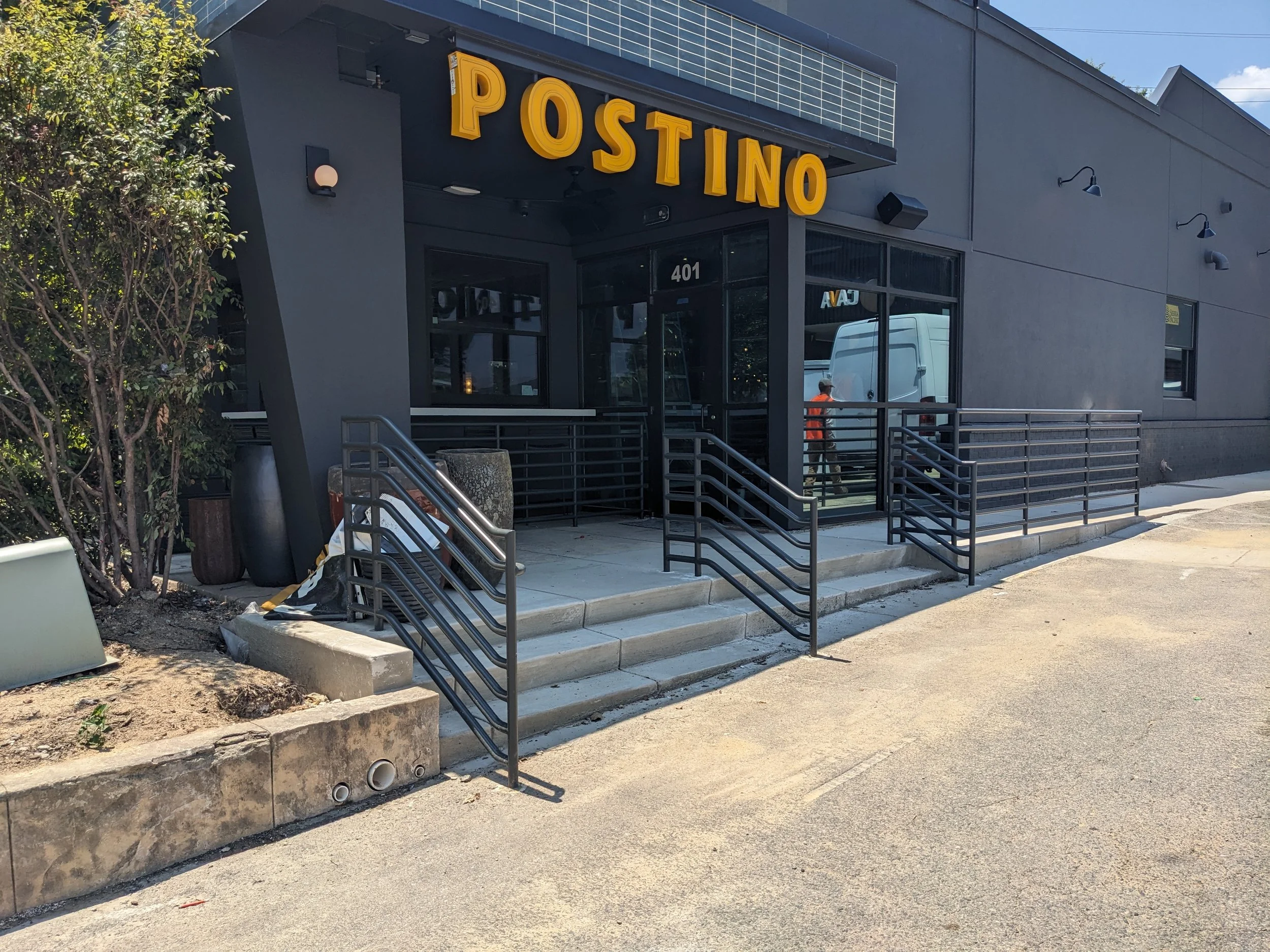 Decorative steel code required rails at Postino in Raleigh