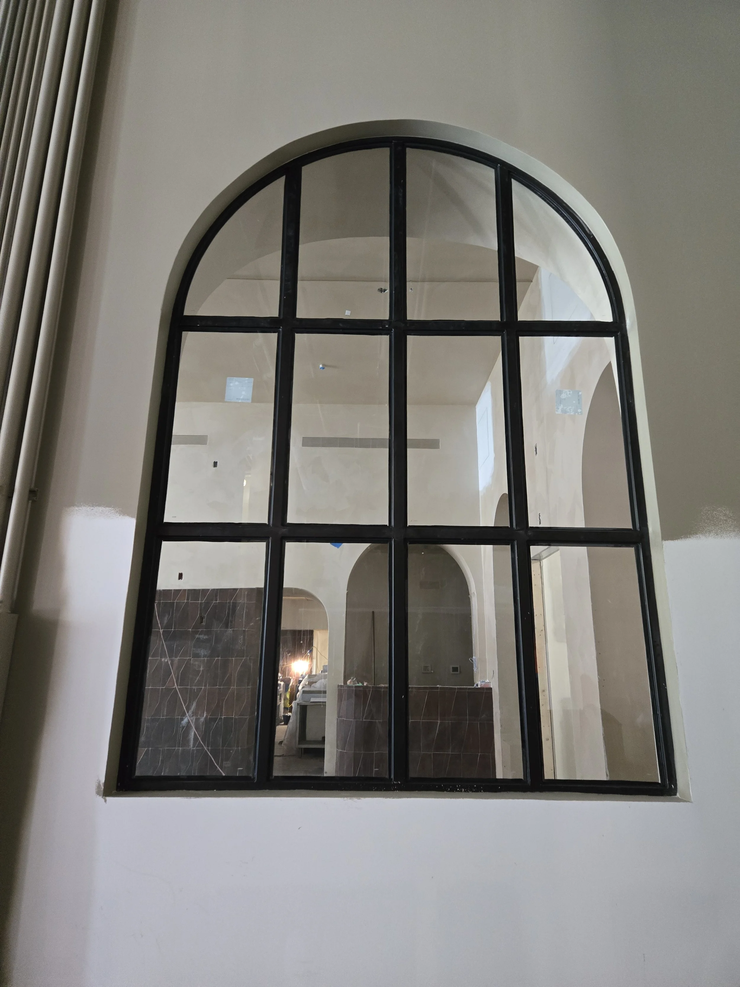 Custom radius window frame.
