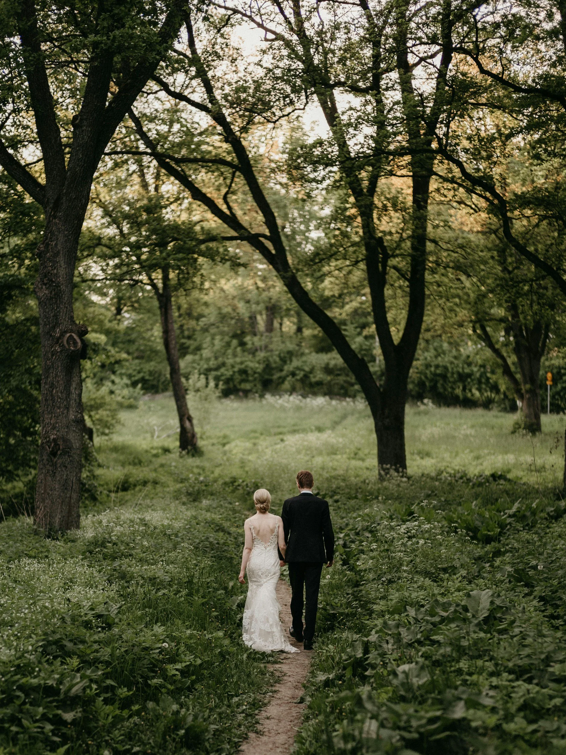 bride and groom in the woods