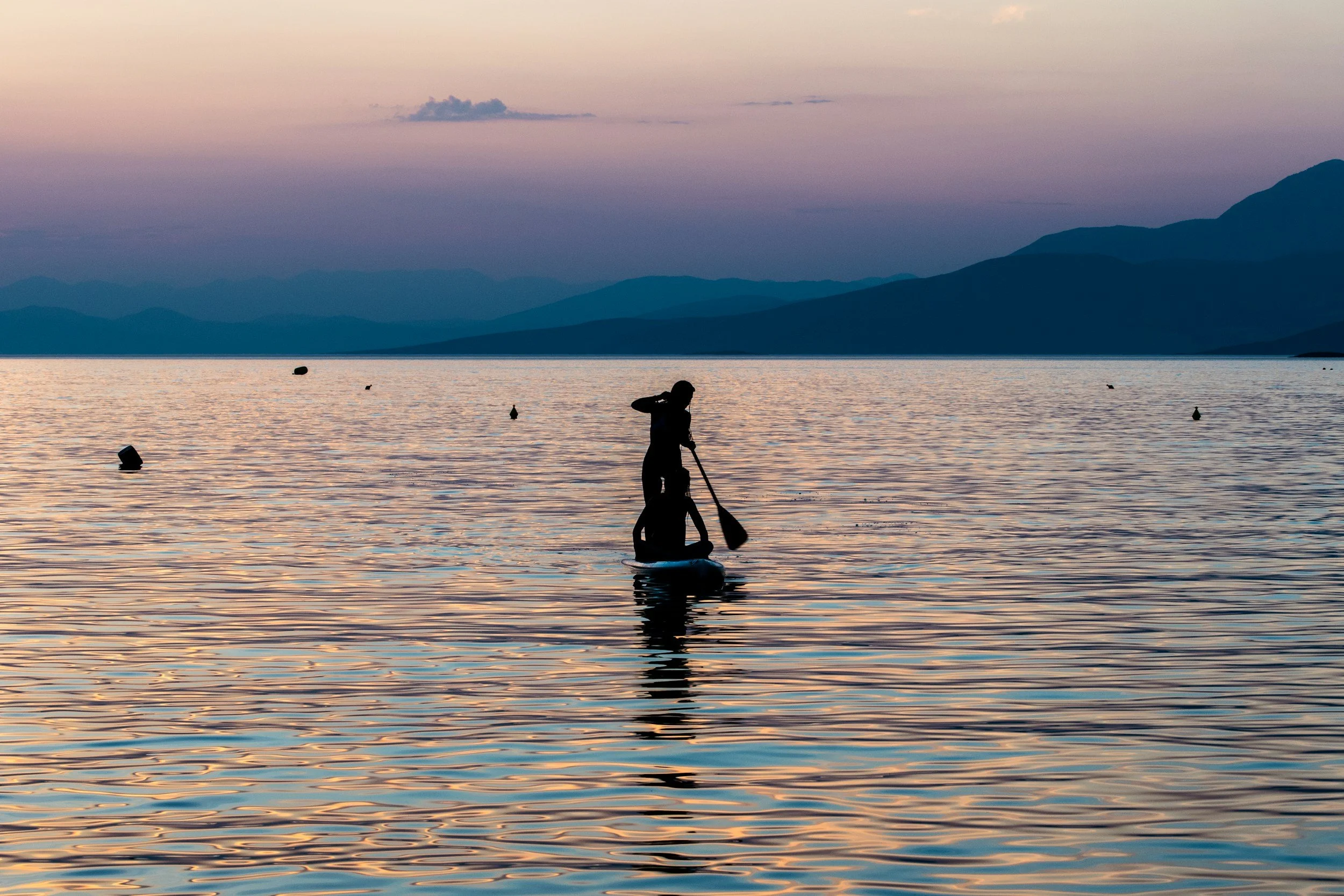 paddleboarding on the bay